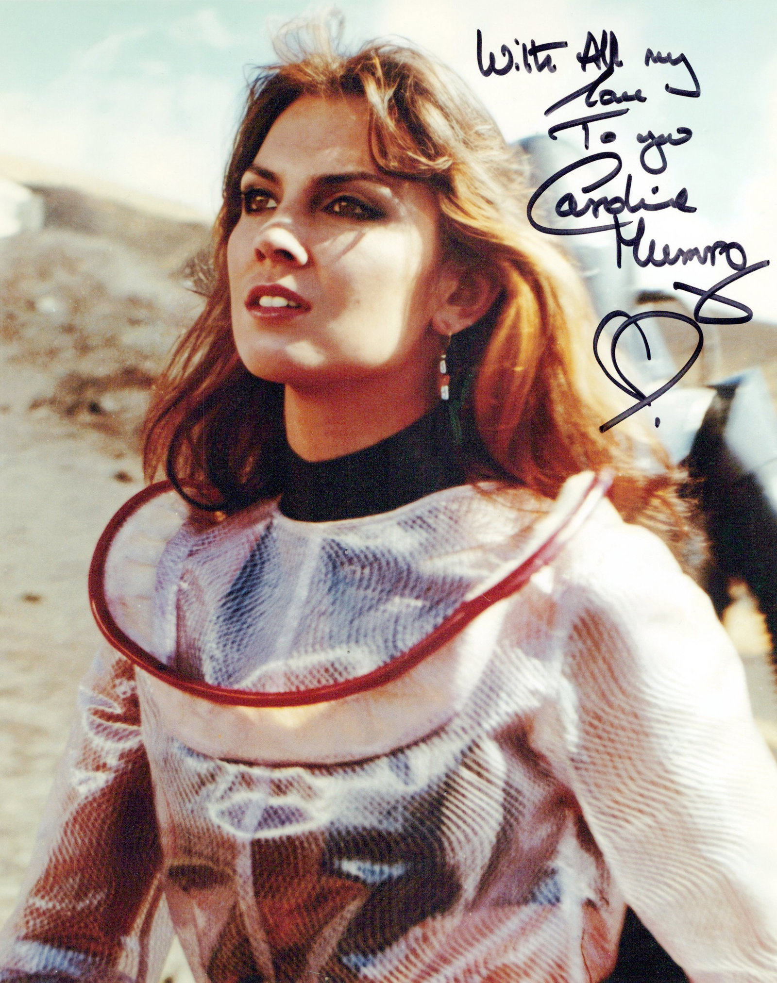 Caroline Munro STARCRASH In Person Signed Photo: Photo size is 8x10. PRIVATE SIGNING. Caroline Munro in person signed photo from the movie STARCRASH. Caroline Munro as the character Stella Star.