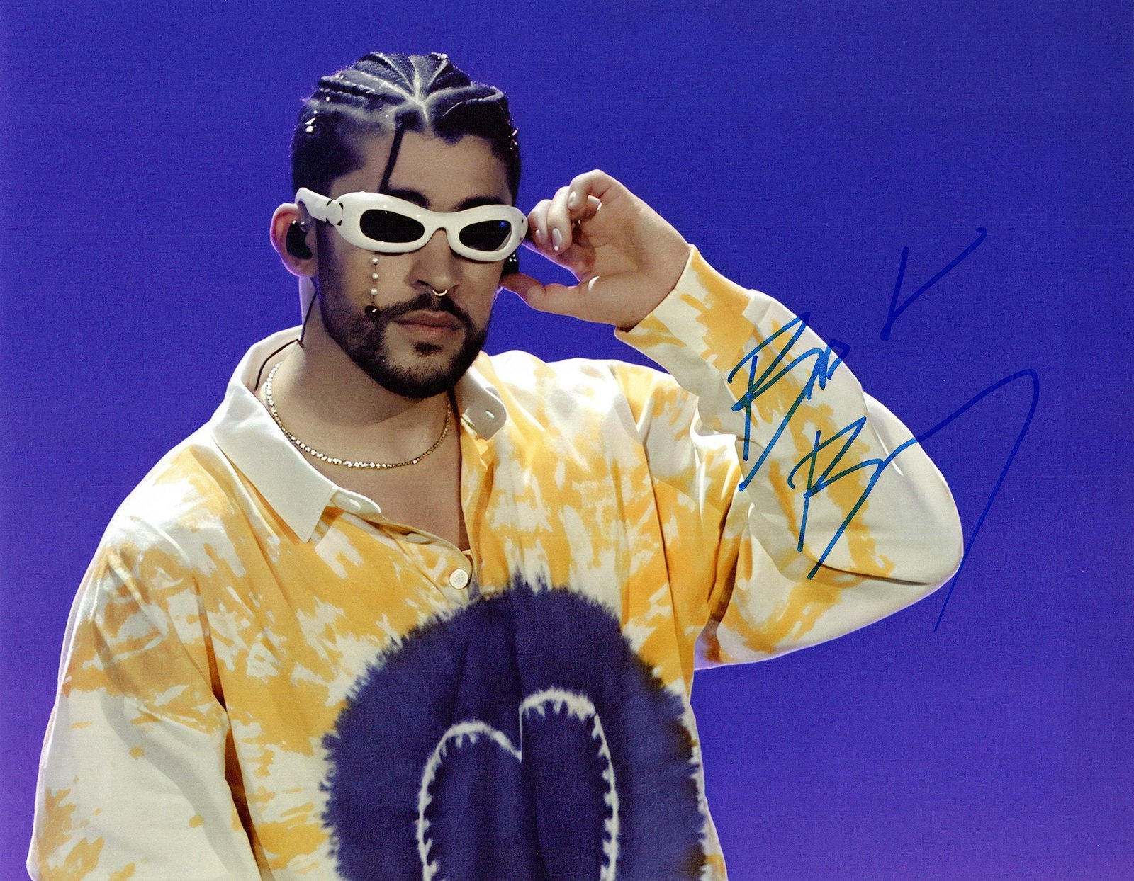 Bad Bunny (Benito Antonio Mart?nez Ocasio) SINGER In Peson Signed Photo: Photo size is 8x10. Bad Bunny (Benito Antonio Mart?nez Ocasio). Benito Antonio Mart?nez Ocasio, known professionally as Bad Bunny, is a Puerto Rican rapper, actor, singer-songwriter, and record produc