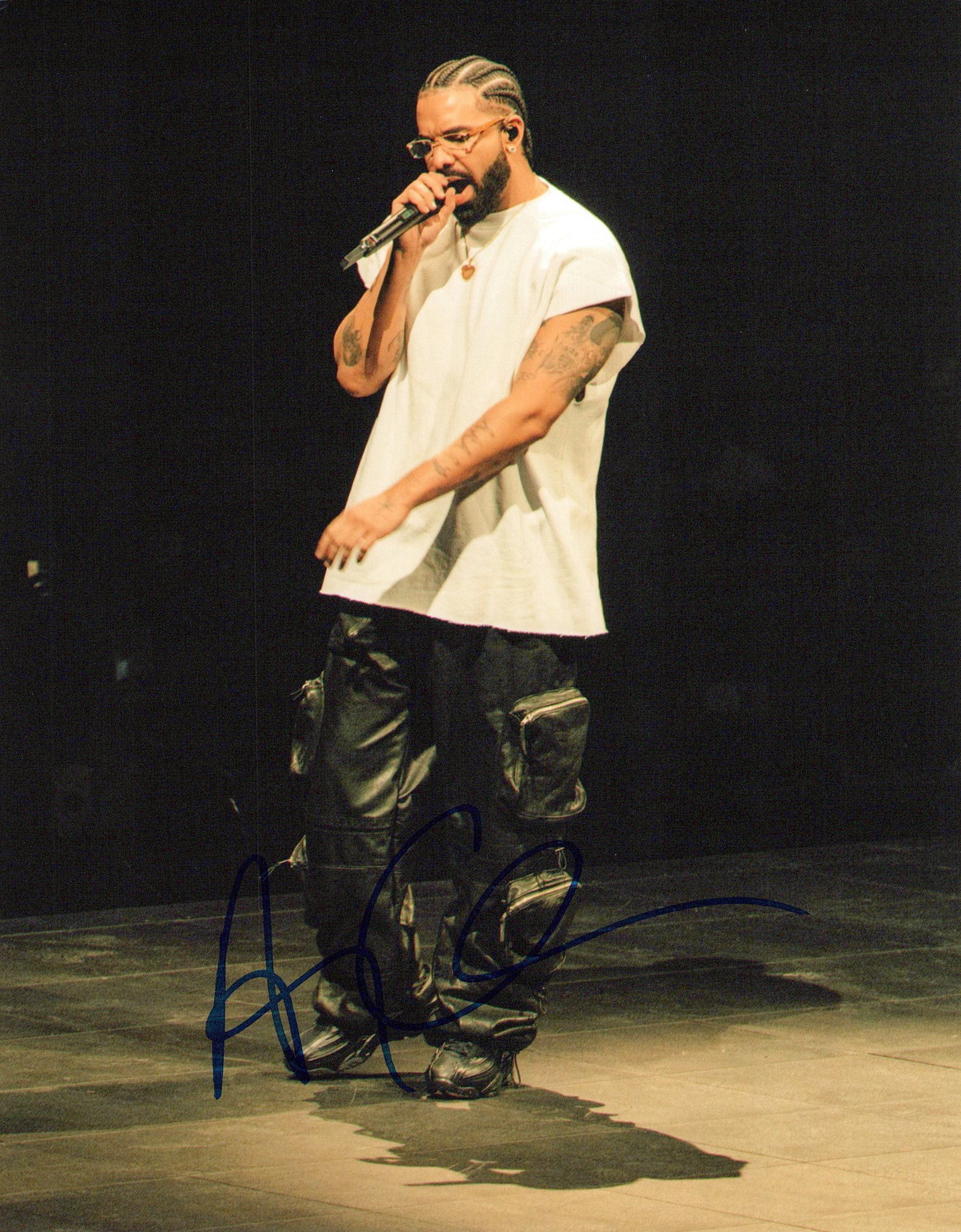 Drake (Aubrey Graham) WRAPPER In Person Signed Photo: Photo size is 8x10. Drake (Aubrey Graham) in person signed photo. Drake, is a Canadian rapper, singer, actor, and marketing innovator. He first became famous for his role as Jimmy Brooks on the Canadi