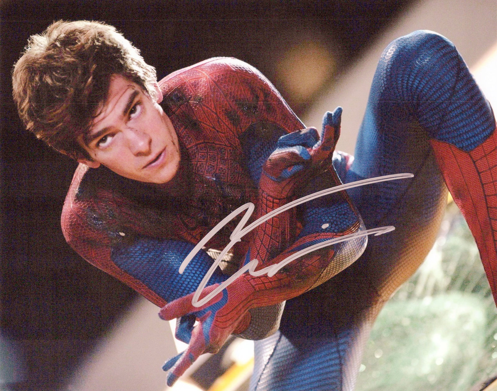Andrew Garfield AMAZING SPIDER-MAN In Person Signed Photo: Photo size is 8x10. Andrew Garfield in person signed photo from the movie THE AMAZING SPIDER-MAN. Andrew Garfield as the character Peter Parker / Spider-Man.