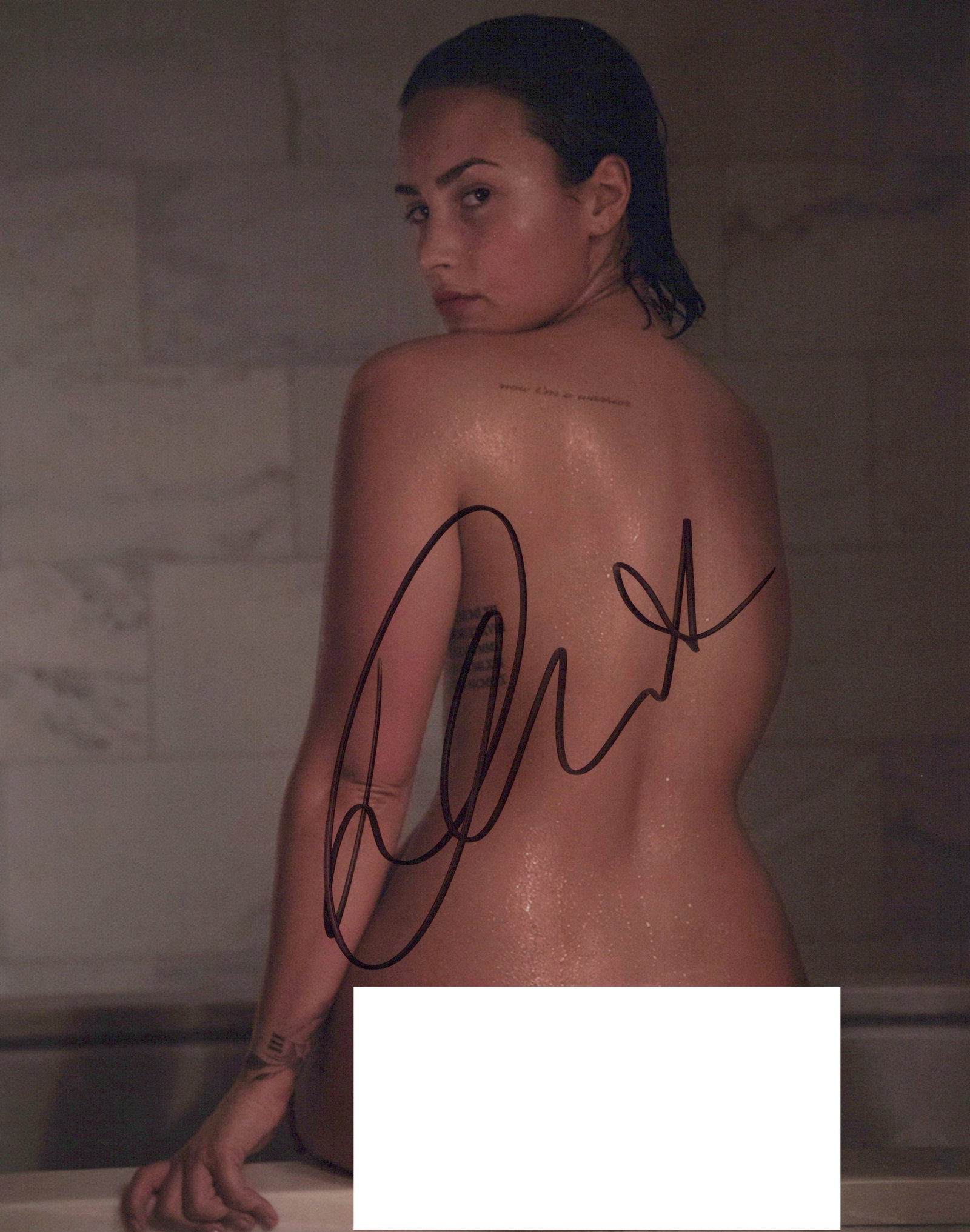 Demi Lovato SINGER / SEXY In Person Signed Photo: Photo size is 8x10. Demi Lovato in person signed autographed photo. Demi Lovato is an American singer, songwriter, and actress. After appearing on the children's television series Barney & Friends, Lo