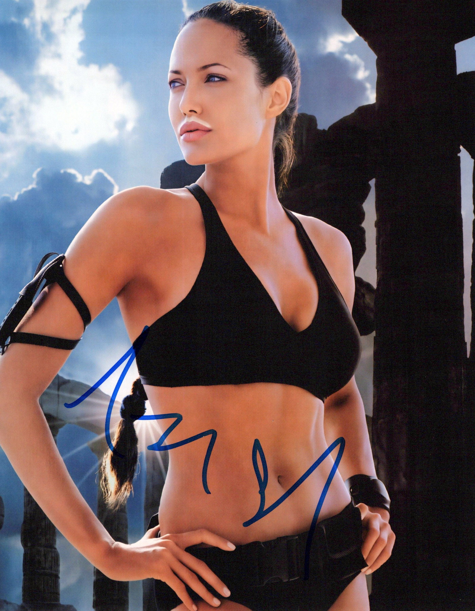 Angelina Jolie TOMB RAIDER In Person Signed Photo: Photo size is 8x10. Angelina Jolie in person signed photo. Of course this was a Tombraider "Got Milk" advertisement. Angelina did play Lara Croft in the TOMB RAIDER films.