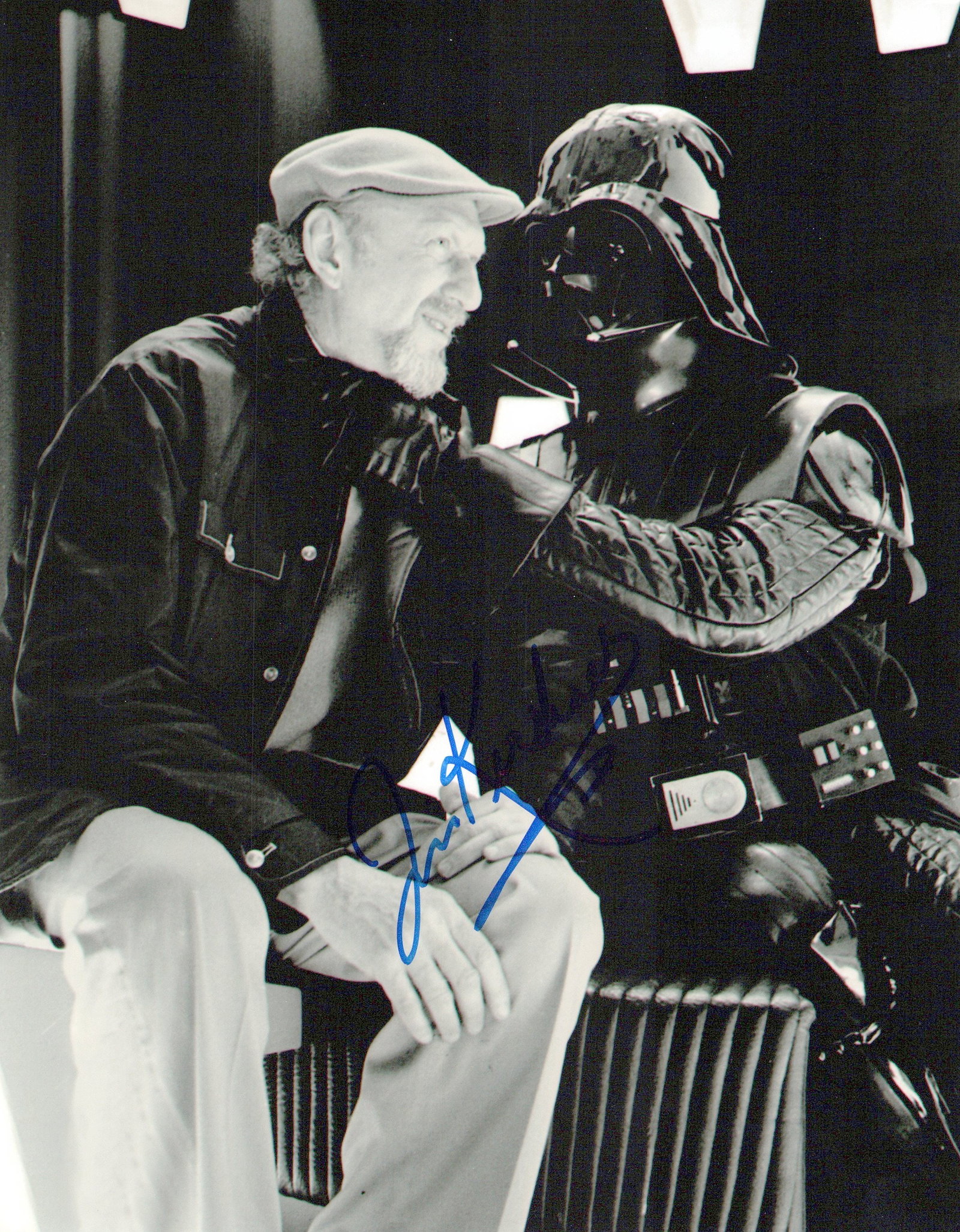 Irvin Kershner STAR WARS DIRECTOR In Person Signed Photo: Photo size is 8x10. Irvin Kershner in persons signed photo. This photograph captures a behind-the-scenes moment from the set of The Empire Strikes Back (1980), featuring director Irvin Kershner intera