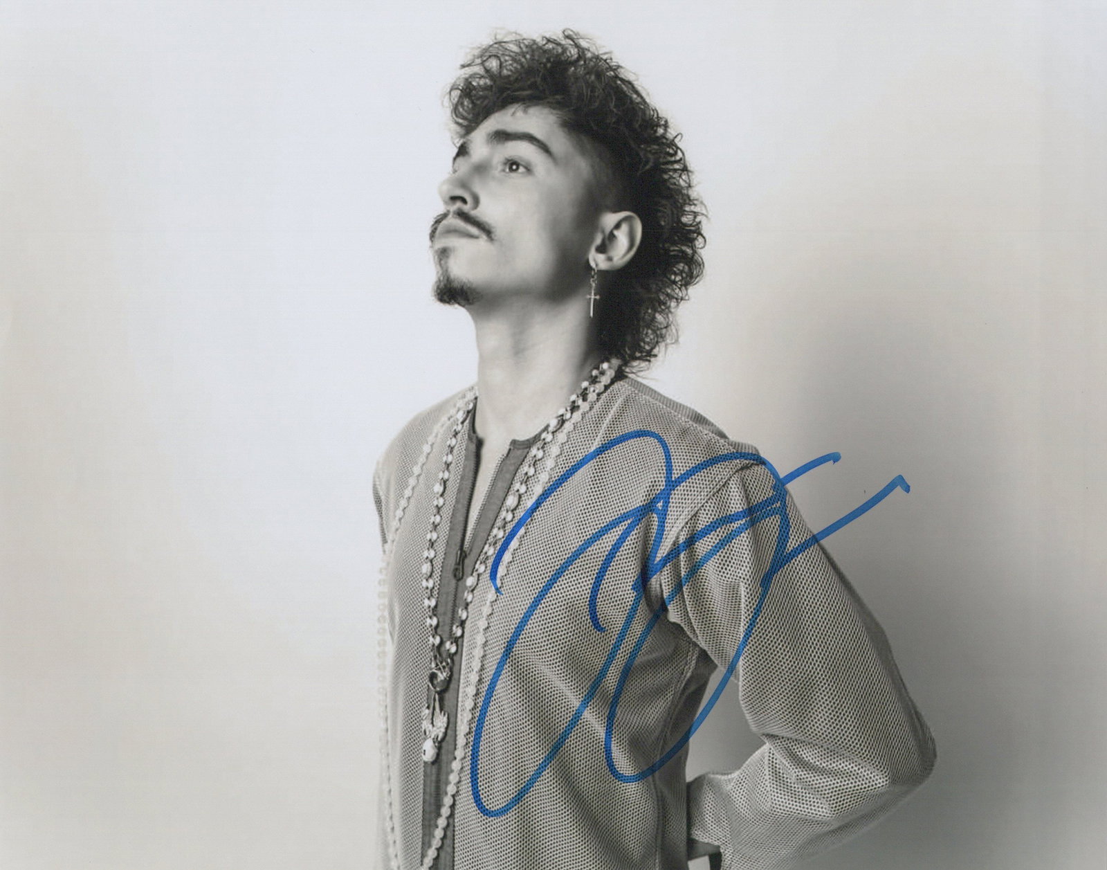Josh Kiszka GRETA VAN FLEET In Person Signed Photo: Photo size is 8x10. Josh Kiszka in person signed photo from the rock band GRETA VAN FLEET. Josh Kiska is known for his unique vocal range and high-energy stage performances. The band has achieved sign