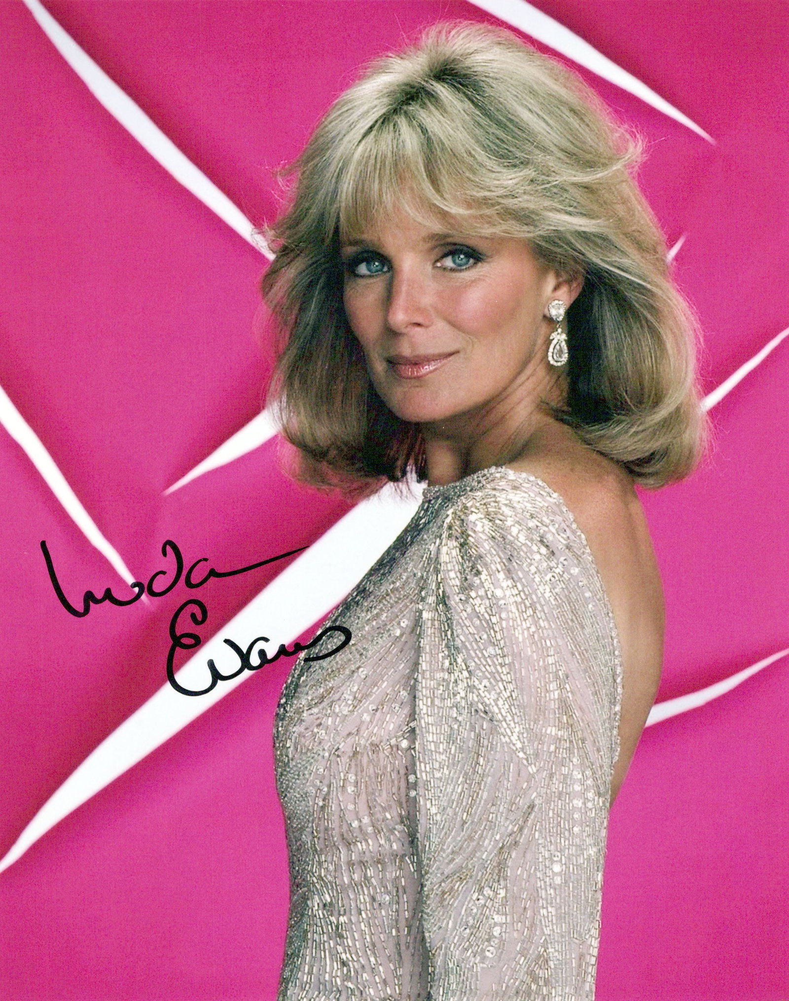 Linda Evans DYNASTY In Person Signed Photo: Photo size is 8x10. Linda Evans in person signed photo from the TV series DYNASTY. Linda Evans has done such TV and movies as THE BIG VALLEY, THE STEPSISTER, but is best known for her charcate as