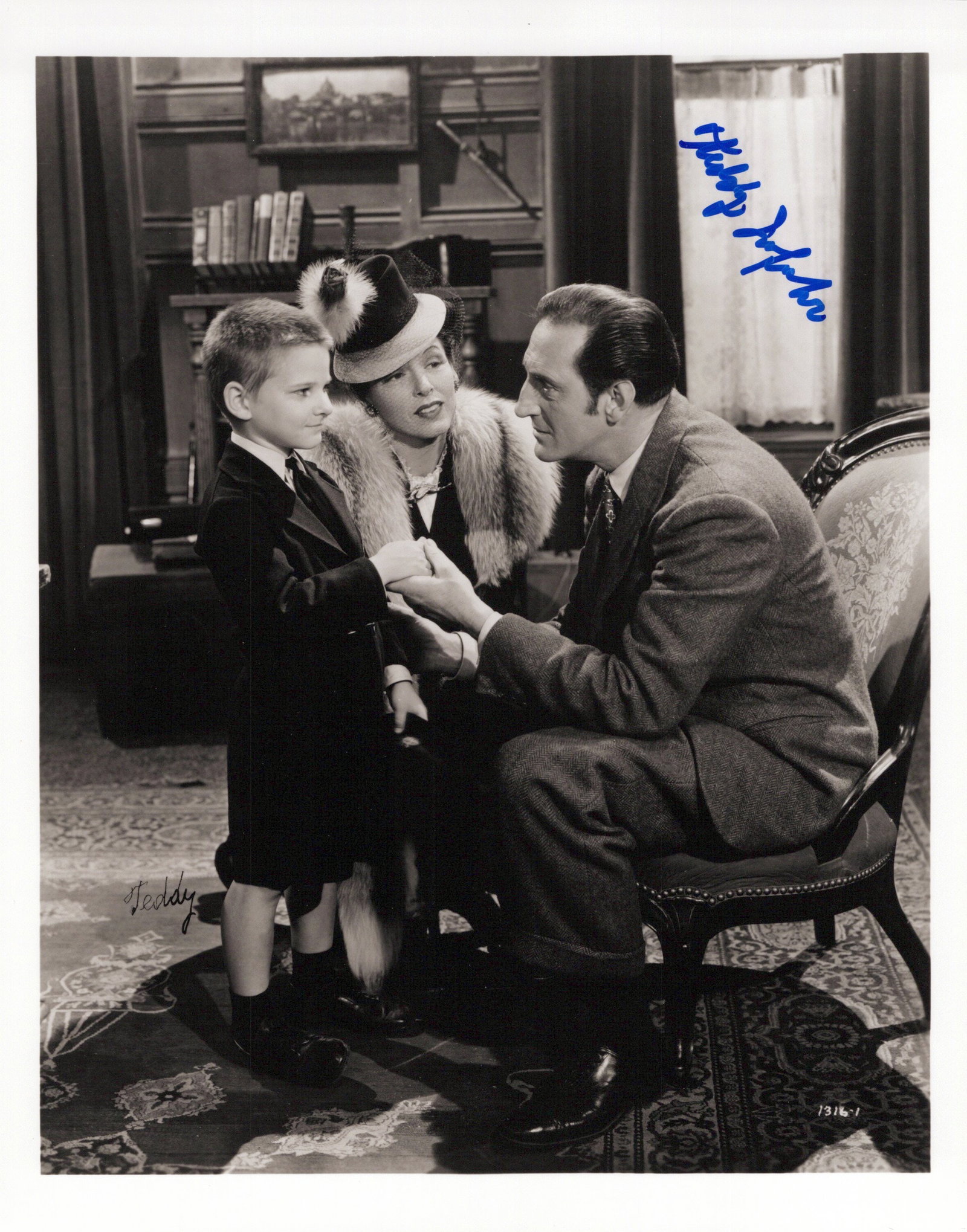 Teddy Infuhr (1936-2007) THE SPIDER WOMAN Signed Photo: Photo size is 8x10. Teddy Infuhr (1936-2007) signed photo from the 1944 movie THE SPIDER WOMAN. Teddy Infuhr as the character Larry.