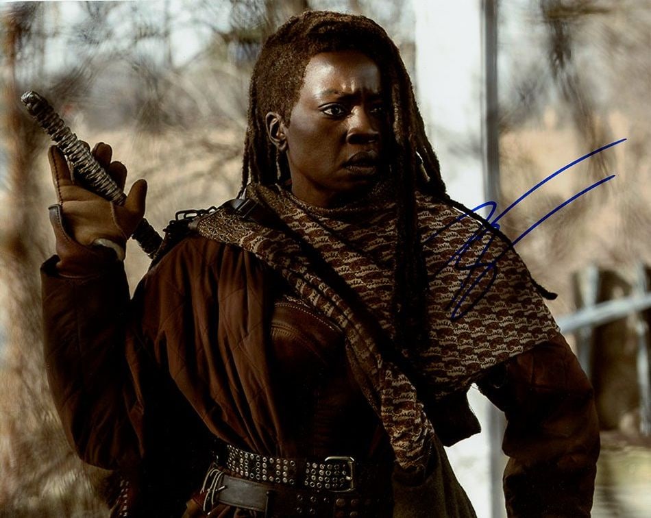 Danai Gurira THE WALKING DEAD In Person Signed Photo: Photo size is 8x10. Danai Gurira in person signed photo from the TV series THE WALKING DEAD. Danai Gurira as the character Michonne Hawthorne.