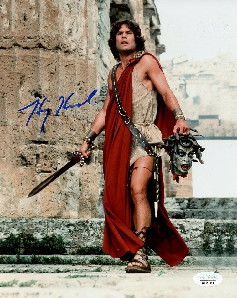 Harry Hamlin CLASH OF THE TITANS (JSA) In Person Signed Photo: Photo size is 8x10. These are JSA Authenticated from a Private Signing. Harry Hamlin in person signed autographed photo from the movie CLASH OF THE TITANS. Harry Hamlin as the character Perseus.