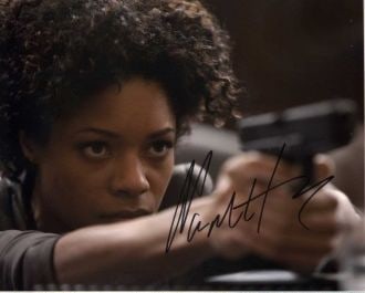 Naomie Harris (James Bond) SKYFALL In Person Signed Photo: Photo size is 8x10. Naomie Harris in person signed photo from the James Bond film SKYFALL. Naomie Harris as the character Eve.