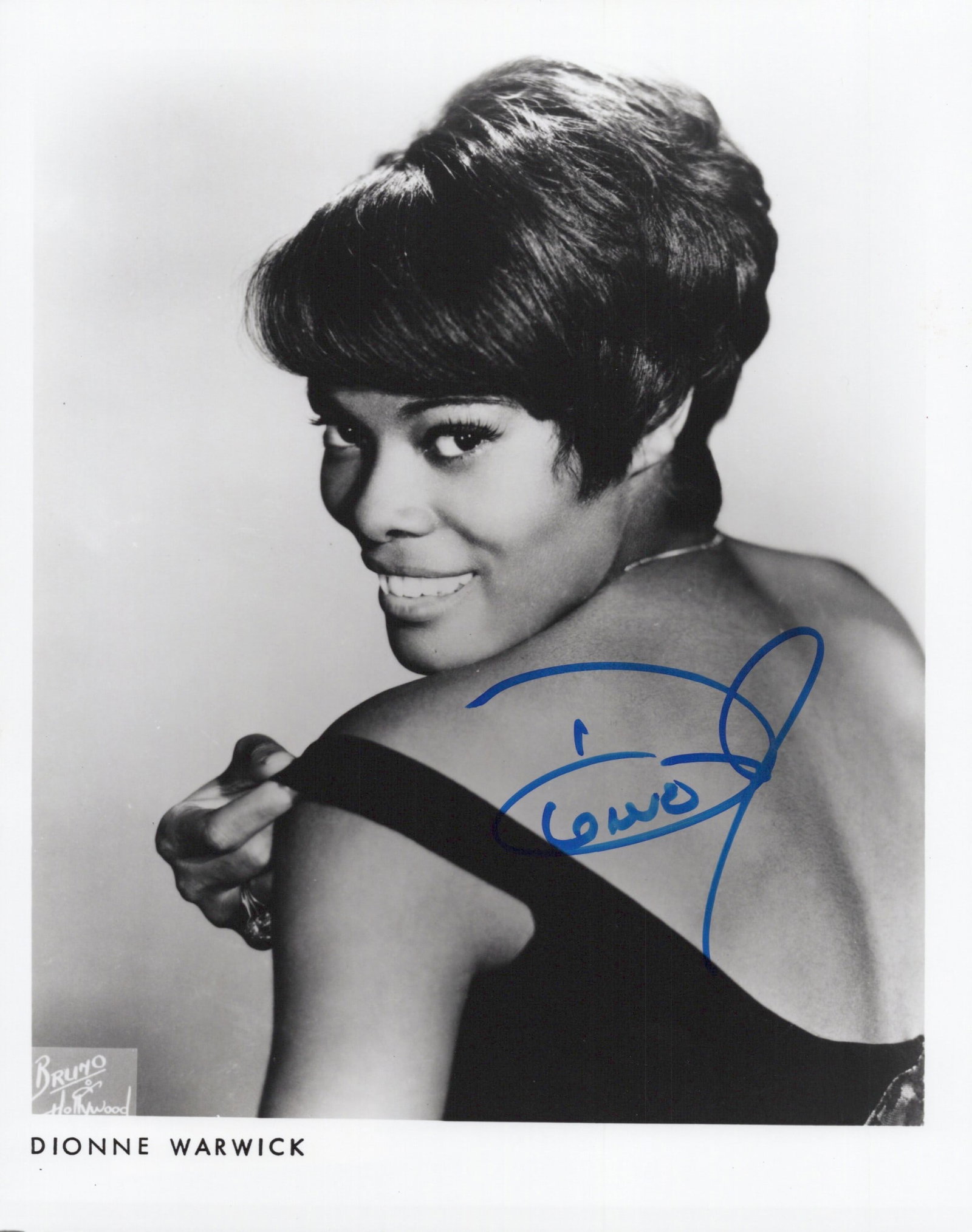Dionne Warwick SINGER In Person Signed Photo: Photo size is 8x10. Dionne Warwick in person signed photo. Marie Dionne Warwick is an American singer, songwriter, actress, and television host with a five-decade career. Known for her smooth voice an