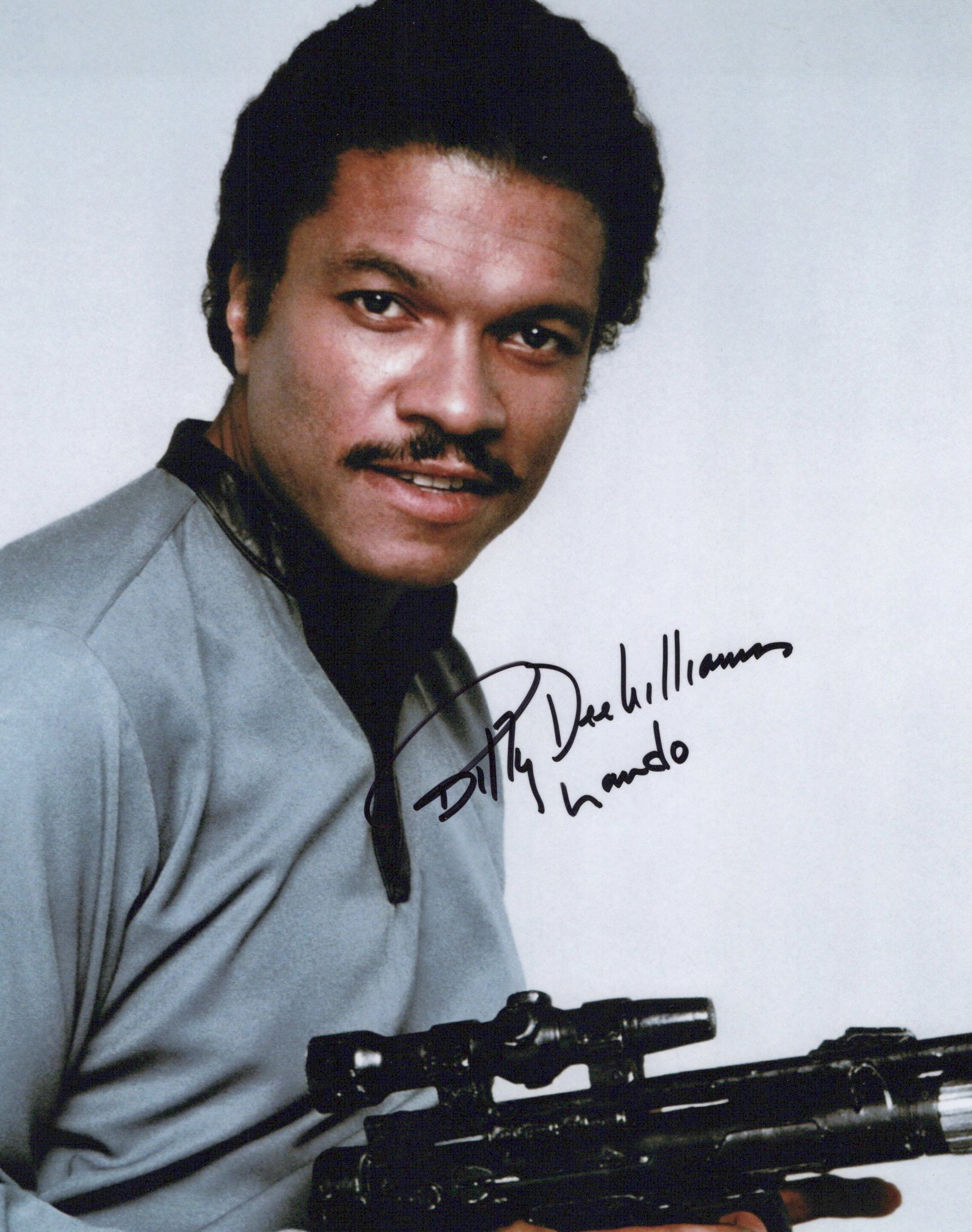 Billy Dee Williams STAR WARS In Person Signed Photo: Photo size is 8x10. Billy Dee Williams in person signed photo from the movie STAR WARS. Billy Dee Williams as the character Lando Calrissian. He has also added Lando.