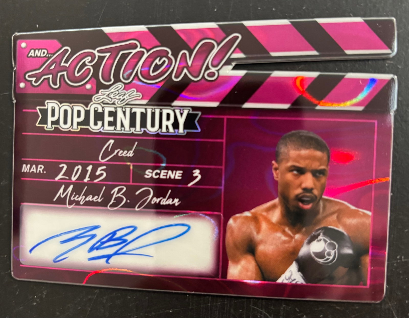 Michael B Jordan #1 of 1 IN ACTION Trading Card: Item size is 3.5x2.75. This item is a Michael B Jordan signed trading card from the AND? ACTION Pop Century insert set by Leaf Trading Cards. Featuring His Role As Adonis Creed in the 2015 Film Creed.
