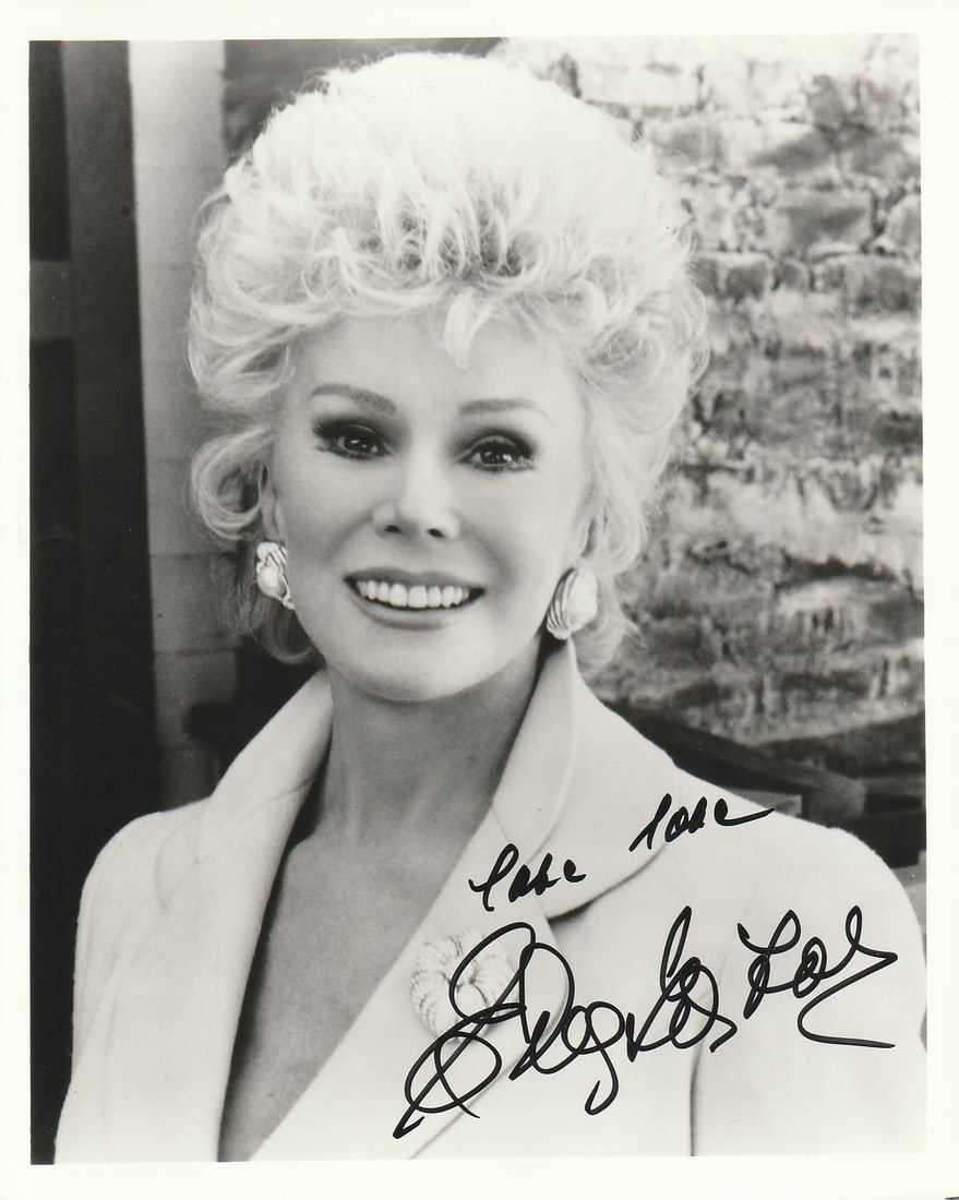 Eva Gabor (1919-1995) GREEN ACRES / THE RESCUERS In Person Signed Photo: Photo size is 8x10. Eva Gabor (1919-1995) in person signed photo. Eva Gabor has done such TV and movies as GREENACRES, THE RESCUERS, and THE ARISTOCRATS