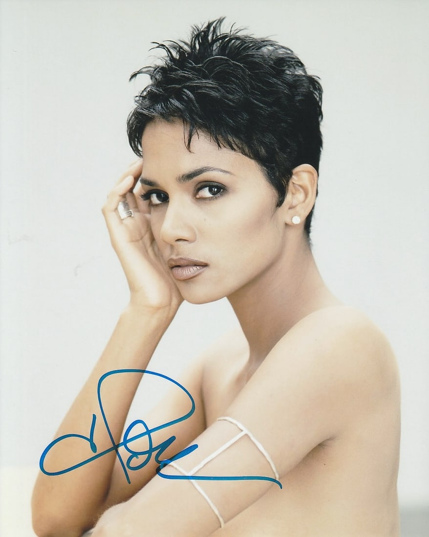 Halle Berry DIE ANOTHER DAY / JOHN WICK In Person Signed Photo: Photo size is 8x10. Halle Berry in person signed photo. Halle Berry has done such movies as DIE ANOTHER DAY, JOHN WITT, and CATWOMAN