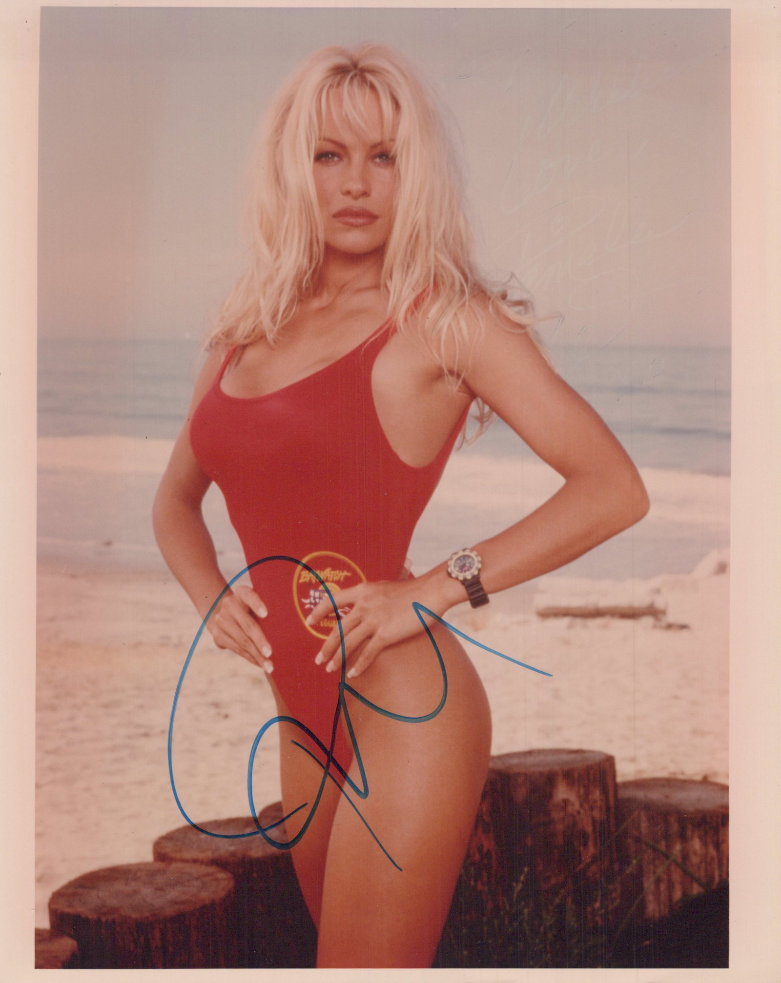 Pamela Anderson BAYWATCH In Person Signed Photo: Photo size is 8x10. Pamela Anderson in person signed photo from the TV series BAYWATCH. Pamela Anderson as the character CJ Parker.