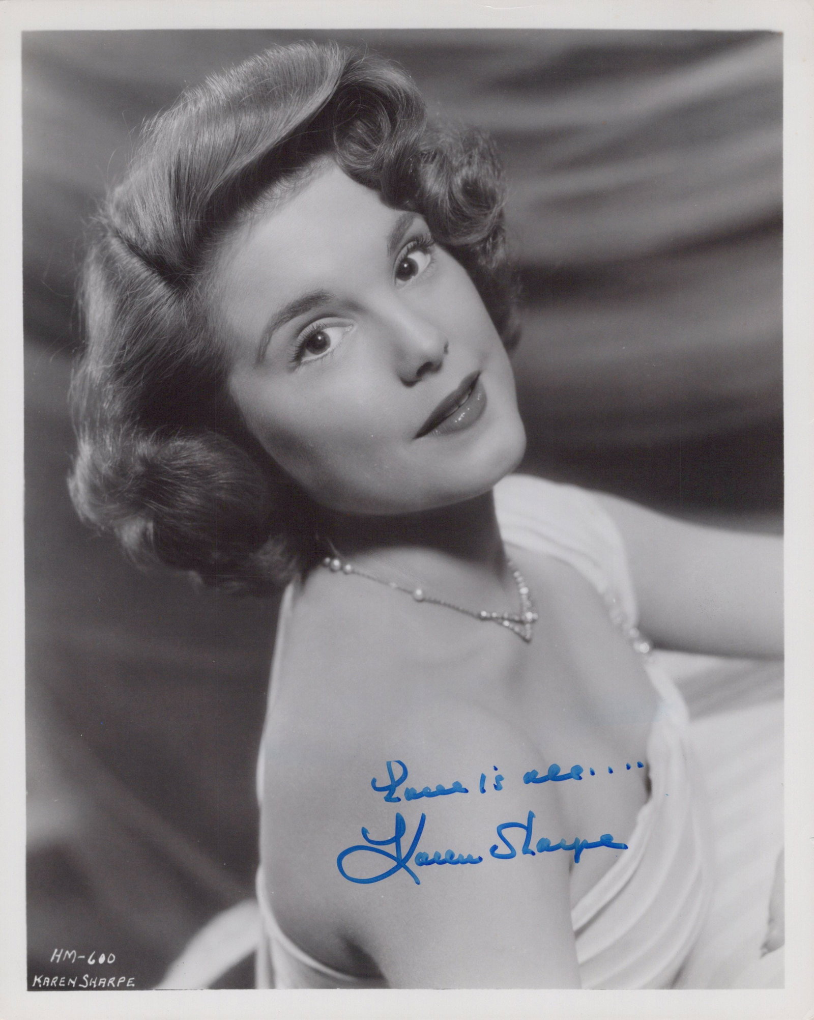 Karen Sharpe BEAUTIFUL Signed Photo: Photo size is 8x10. Karen Sharpe signed photo. Karen Sharpe is a retired American film and television actress, best known for her role in the 1950 TV series JOHNNY RINGO.