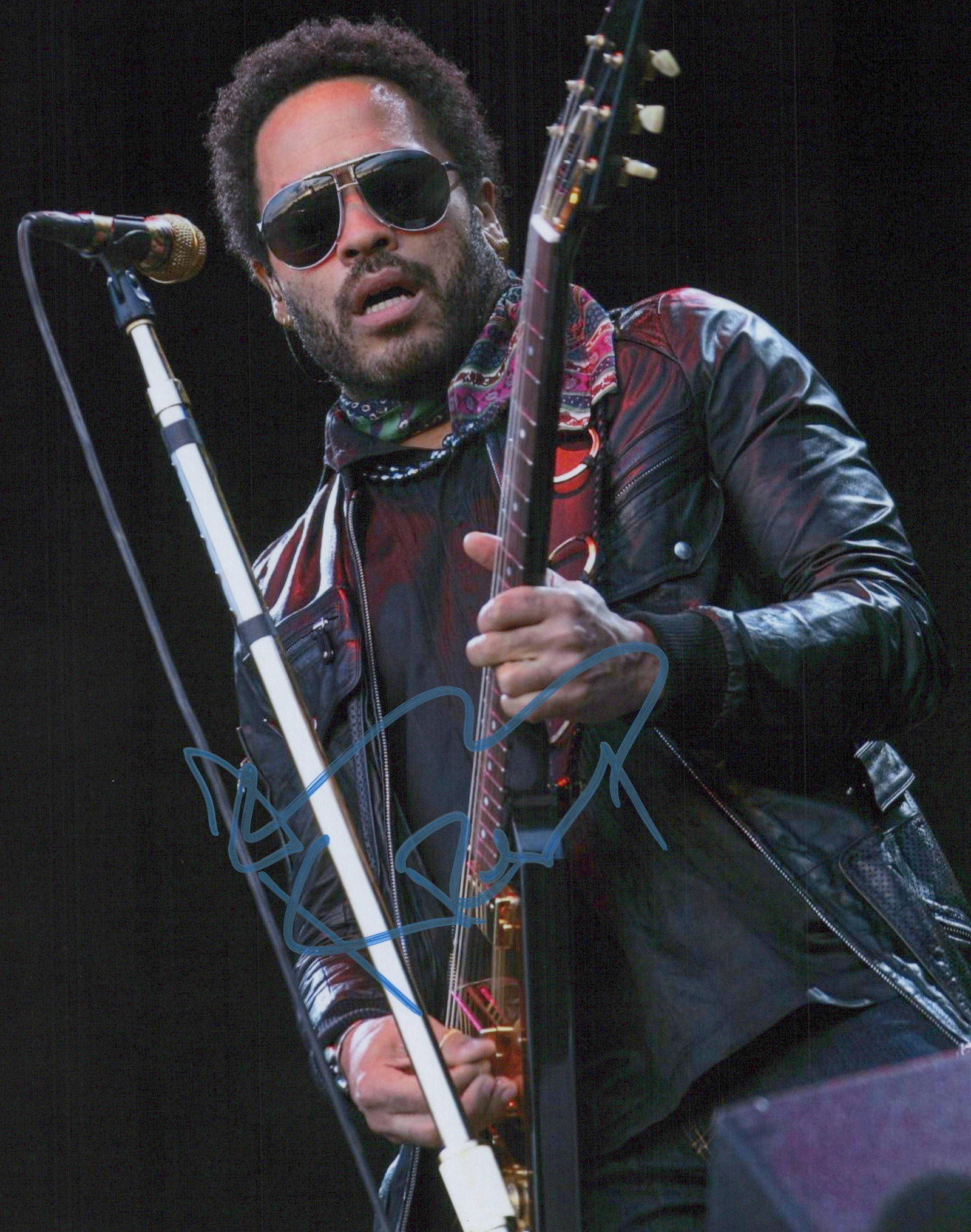 Lenny Kravitz MUSICIAN In Person Signed Photo: Photo size is 8x10. Lenny Kravitz in person signed photo. Lenny Kravitz is an American singer-songwriter, multi-instrumentalist and actor. Born in New York to TV news producer Sy Kravitz and actress R