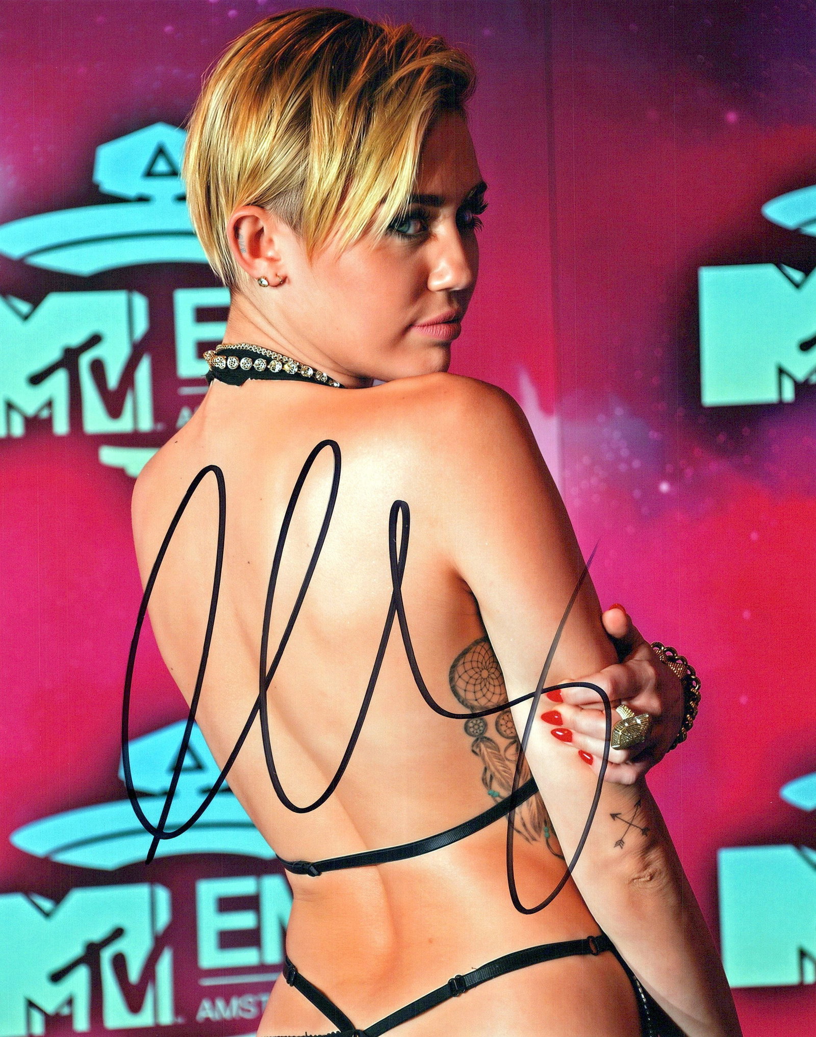 Miley Cyrus SEXY In Person Signed Photo: Photo size is 8x10. Miley Cyrus hot in person signed photo. Miley Cyrus has been in such movies as THE LAST SONG, LOL, and HANNAH MONTANA