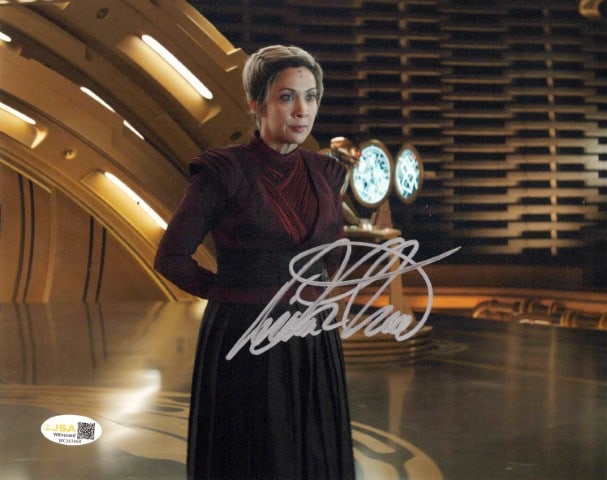 Diana Lee Inosanto AHSOKA (JSA) In Person Signed Photo: Photo size is 8x10. PRIVATE SIGNING - JSA AUTHENTICATED. Diana Lee Inosanto in person signed photo from the movie AHSOKA. Diana Lee Inosanto as the character Morgan Elsbeth.