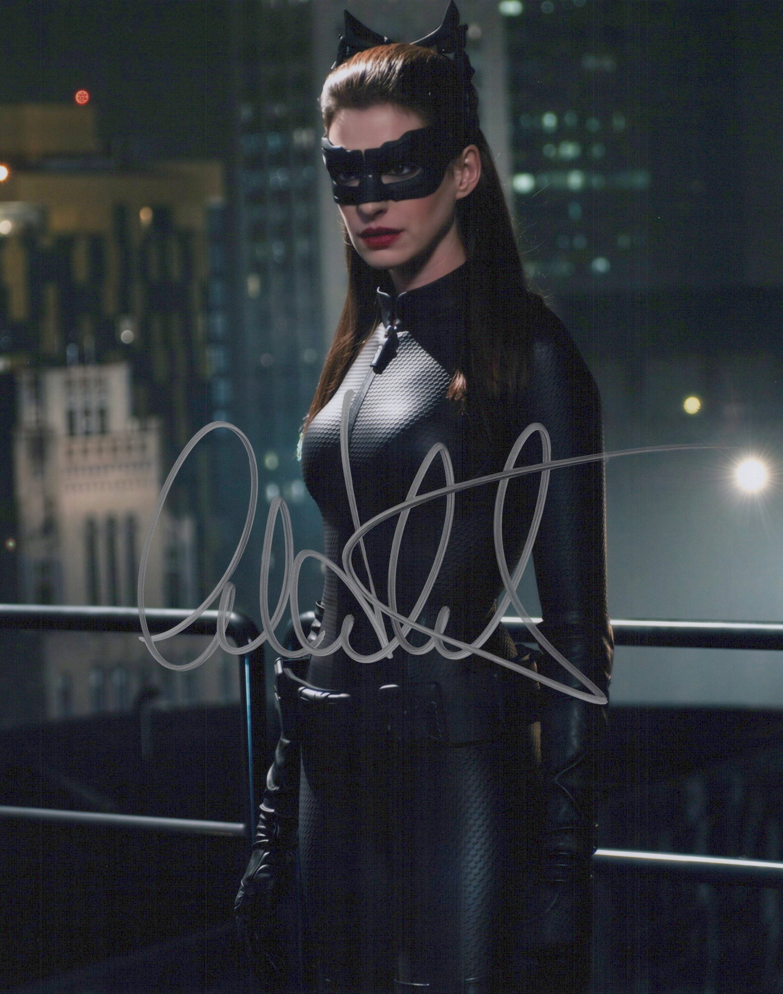Anne Hathaway DARK KNIGHT RISES In Person Signed Photo: Photo size is 8x10. Anne Hathaway in person signed photo from the movie THE DARK KNIGHT RISES. Anne Hathaway as the character Selena / Catwoman