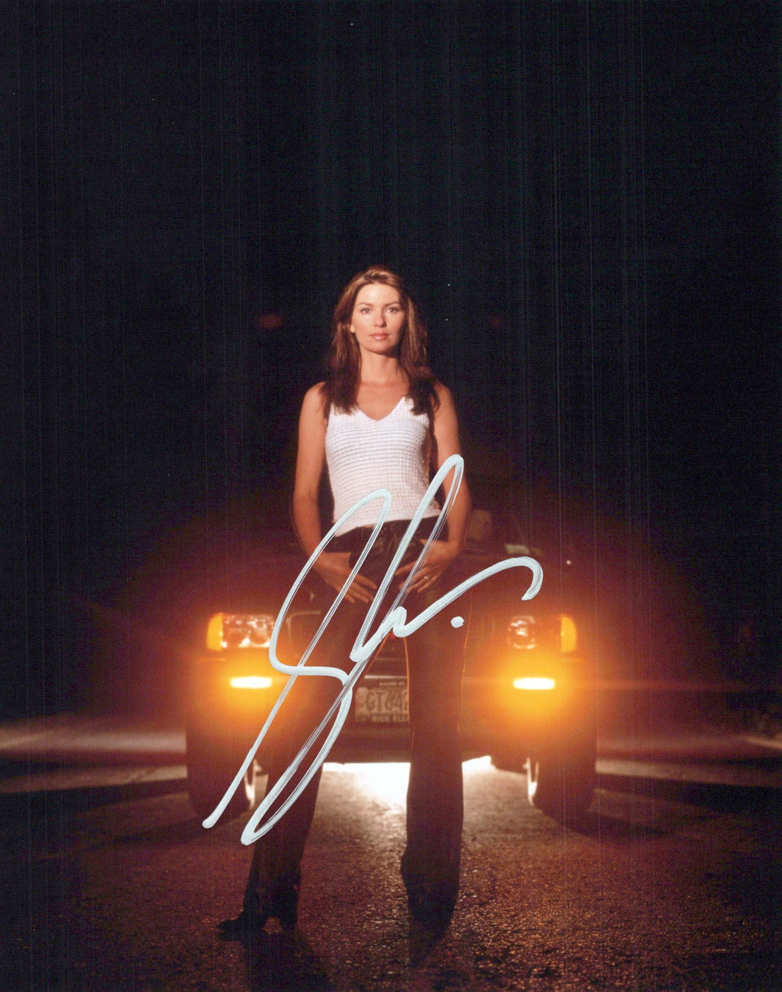 Shania Twain COUNTRY SUPERSTAR In Person Signed Photo: Shania Twain in Person Signed Photo. Shania Twain is a Canadian country singer and songwriter. She has sold more than 100 million records, making her one of the best-selling music artists of all time 