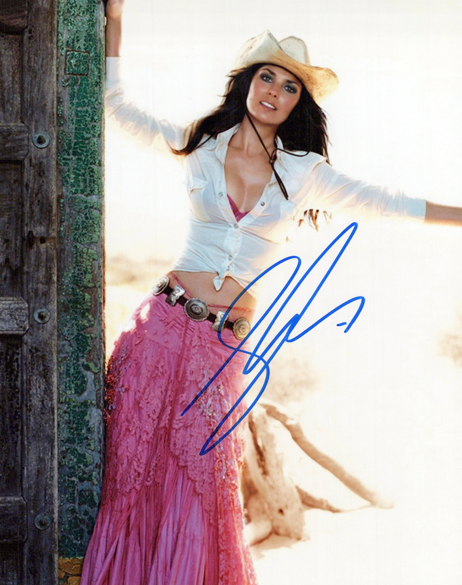 Shania Twain COUNTRY SUPERSTAR In Person Signed Photo: Shania Twain in Person Signed Photo. Shania Twain is a Canadian country singer and songwriter. She has sold more than 100 million records, making her one of the best-selling music artists of all time 