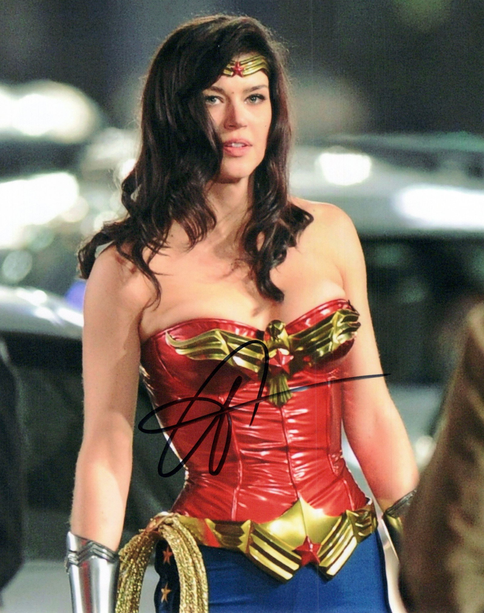 Adrianne Palicki WONDER WOMAN In Person Signed Photo: Photo size is 8x10. Adrianne Palicki in person signed photo from the on aired TV series WONDER WOMAN. Wonder Woman is an unaired superhero television pilot produced by Warner Bros. Television and DC E