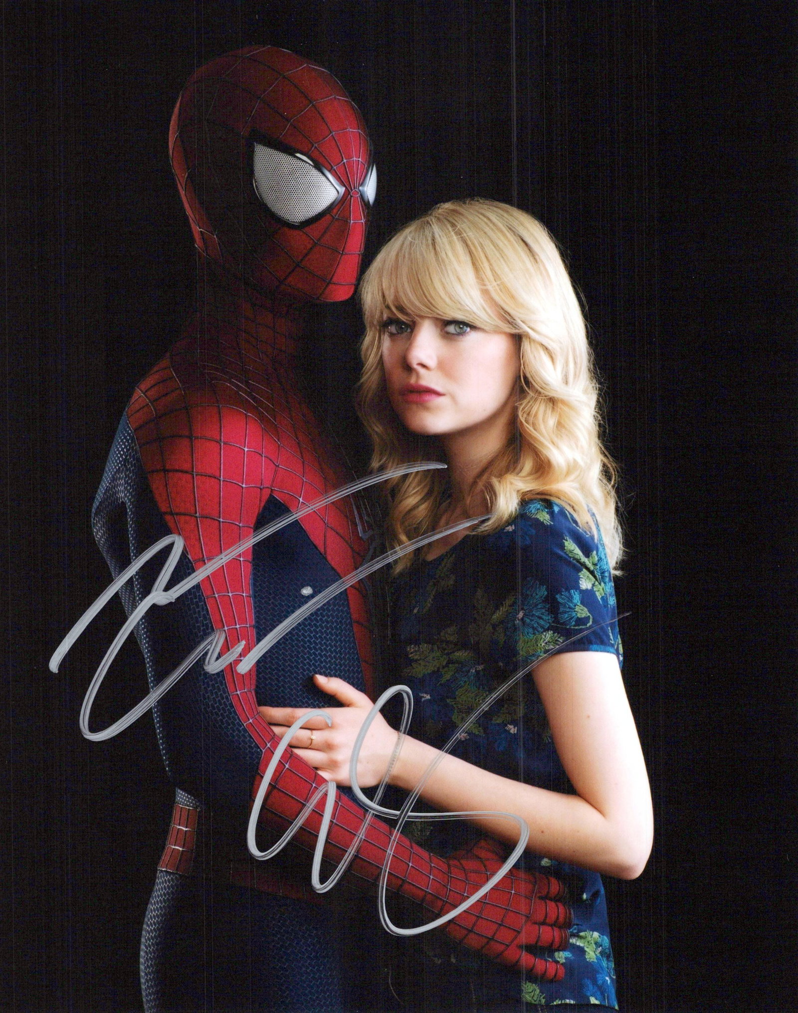 Andrew Garfield / Emma Stone AMAZING SPIDER-MAN In Person Signed Photo: Photo size is 8x10. Andrew Garfield / Emma Stone in person signed photo from the movie THE AMAZING SPIDER-MAN. Andrew Garfield as the character Peter Parker / Spider-Man. Emma Stone as the character G