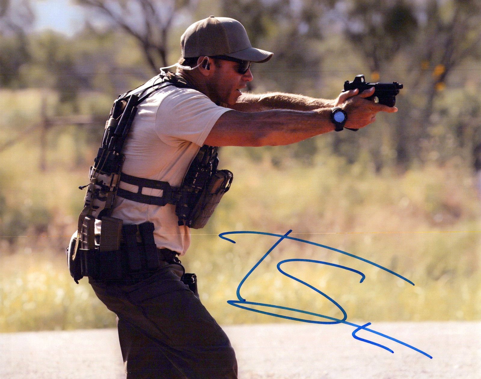 Taylor Sheridan LIONESS In Person Signed Photo: Photo size is 8x10. Taylor Sheridan in person signed photo from the TV series LIONESS. Taylor Sheridan as the character Delta force operator Cody Spears