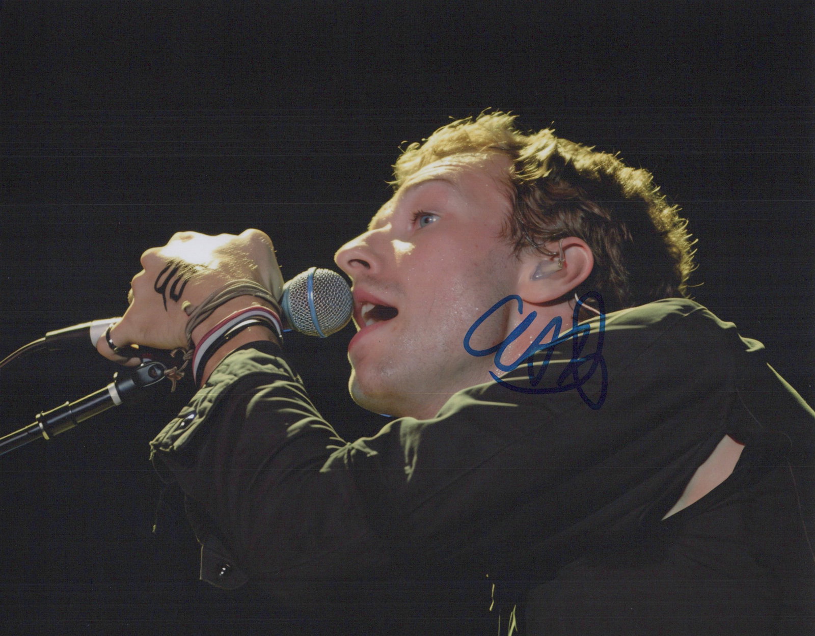 Chris Martin COLDPLAY In Person Signed Photo: Photo size is 8x10. Chris Martin in person signed photo. Christopher Anthony John Martin is an English singer, songwriter and music producer. He is best known as the vocalist, pianist and co-founder o