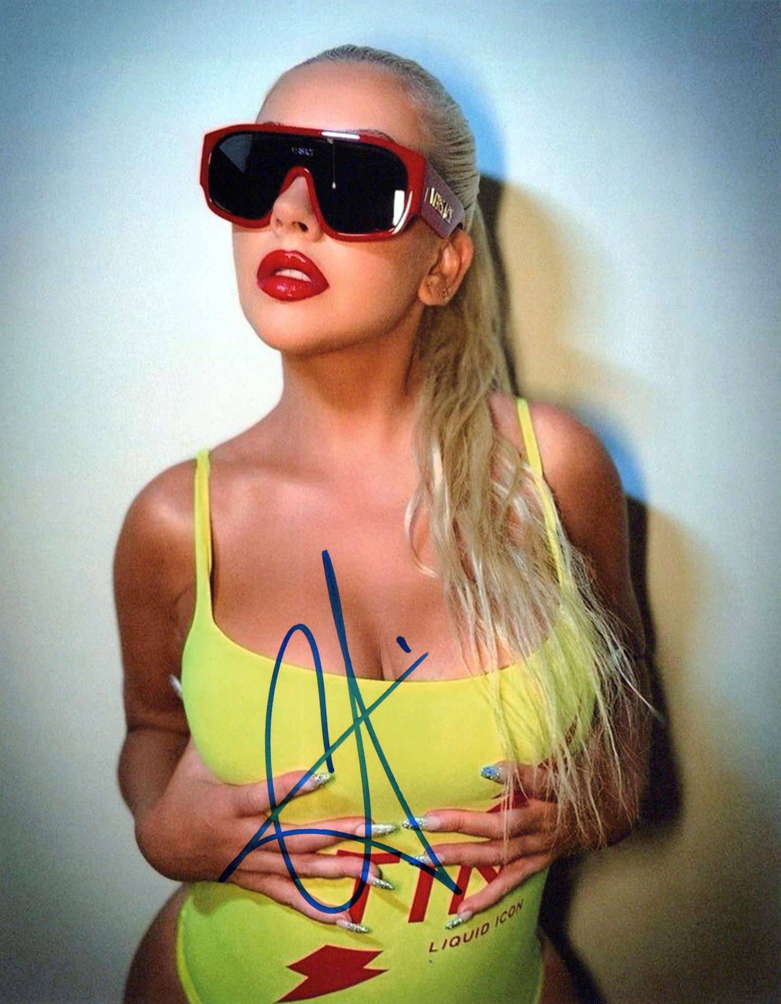 Christina Aguilera MUSICIAN In Person Signed Photo: Photo size is 8x10. Christina Aguilera in person signed autographed photo. Christina Aguilera is an American singer, songwriter, actress, and television personality. Her accolades include five Grammy 