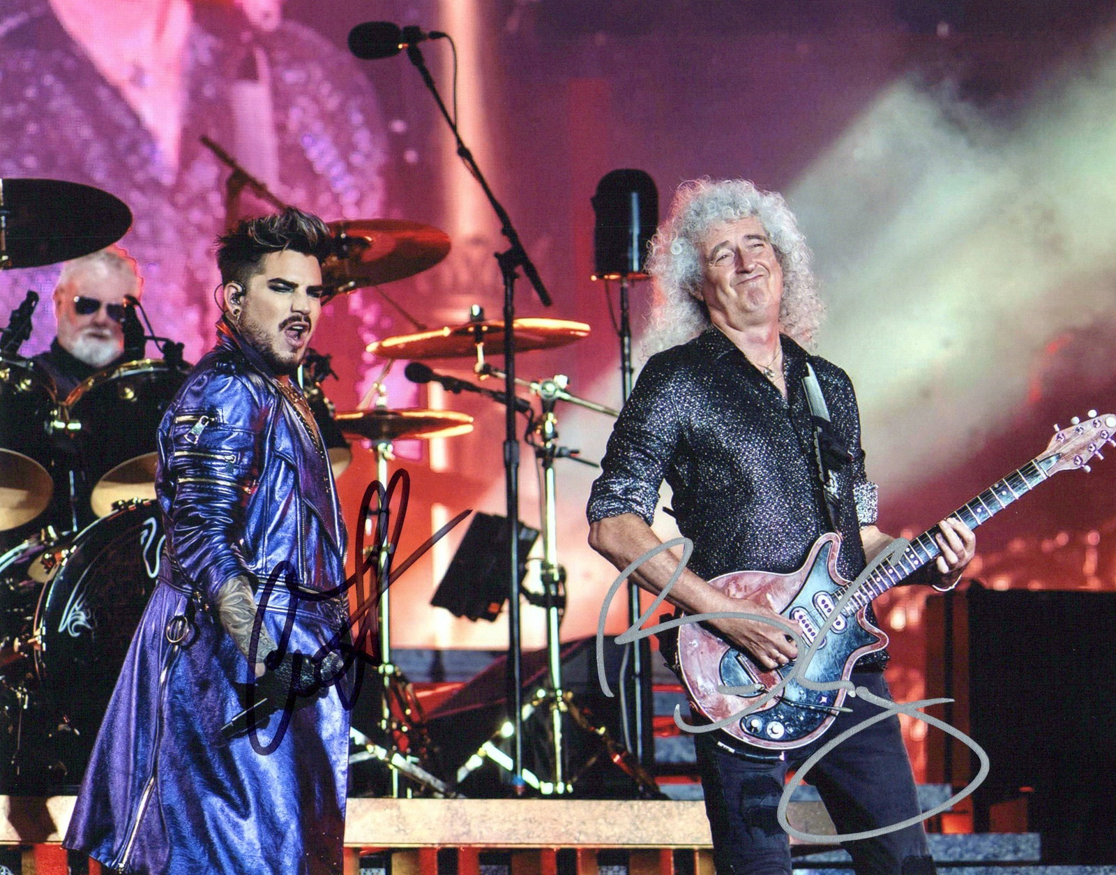Adam Lambert / Brian May RHAPSODY TOUR In Person Signed Photo: Photo size is 8x10. Adam Lambert / Brian May in person signed photo. This photo captures a live performance by the band Queen + Adam Lambert, featuring singer Adam Lambert and guitarist Brian May. The
