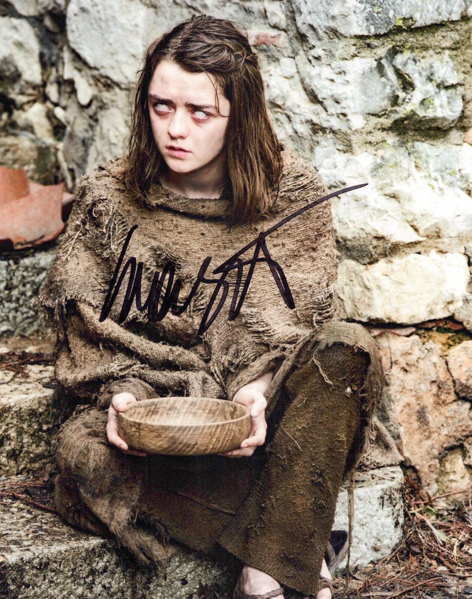 Maisie Williams GAME OF THRONES In Person Signed Photo: Photo size is 8x10. Maisie Williams in person signed autographed photo from the HBO series GAME OF THRONES. Maisie Williams as the character Arya Stark.