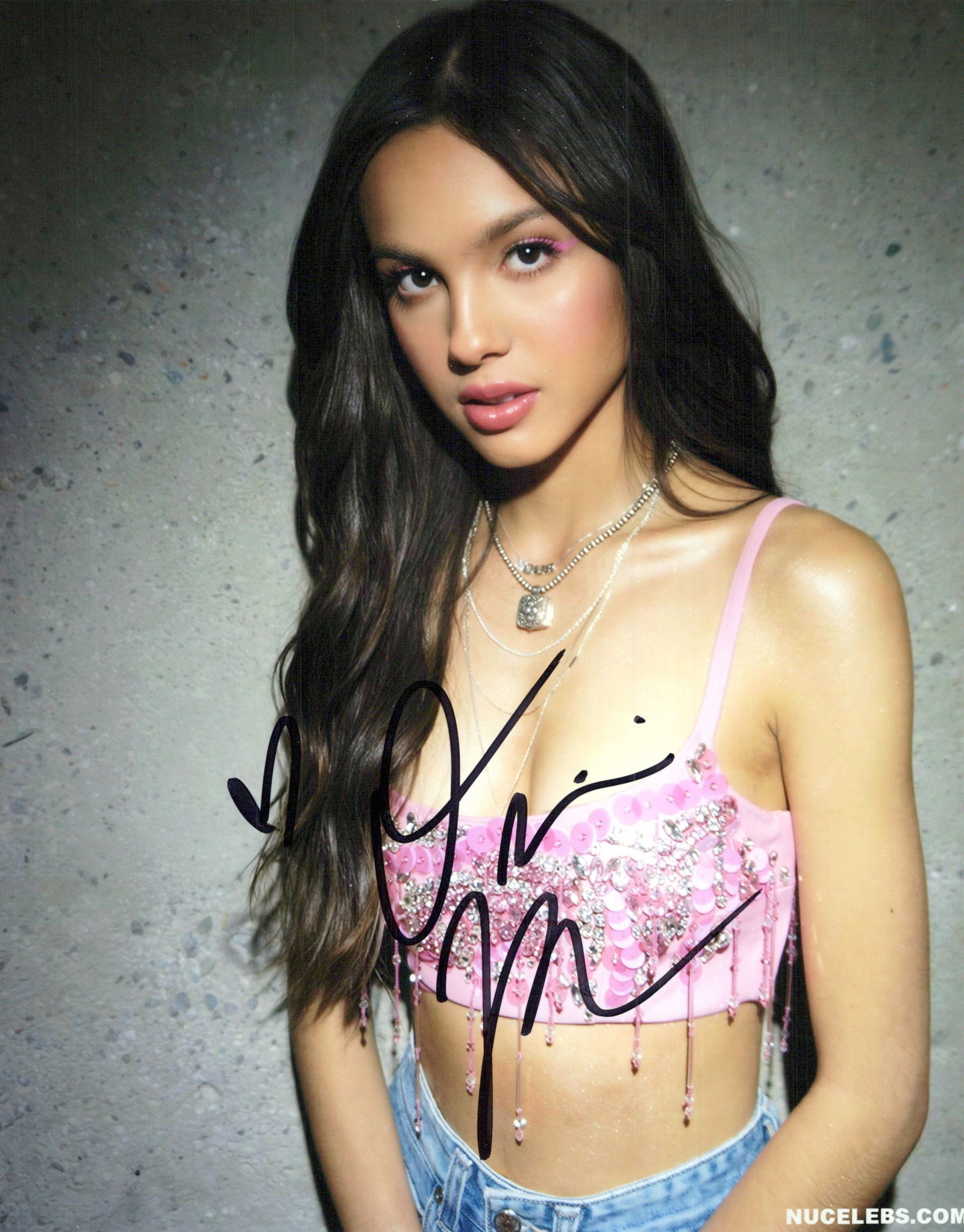 Olivia Rodrigo SINGER In Person Signed Photo: Photo size is 8x10. Olivia Rodrigo in person signed photo. Olivia Isabel Rodrigo is an American singer-songwriter and actress. Rodrigo began her career as a child actress, appearing in commercials and