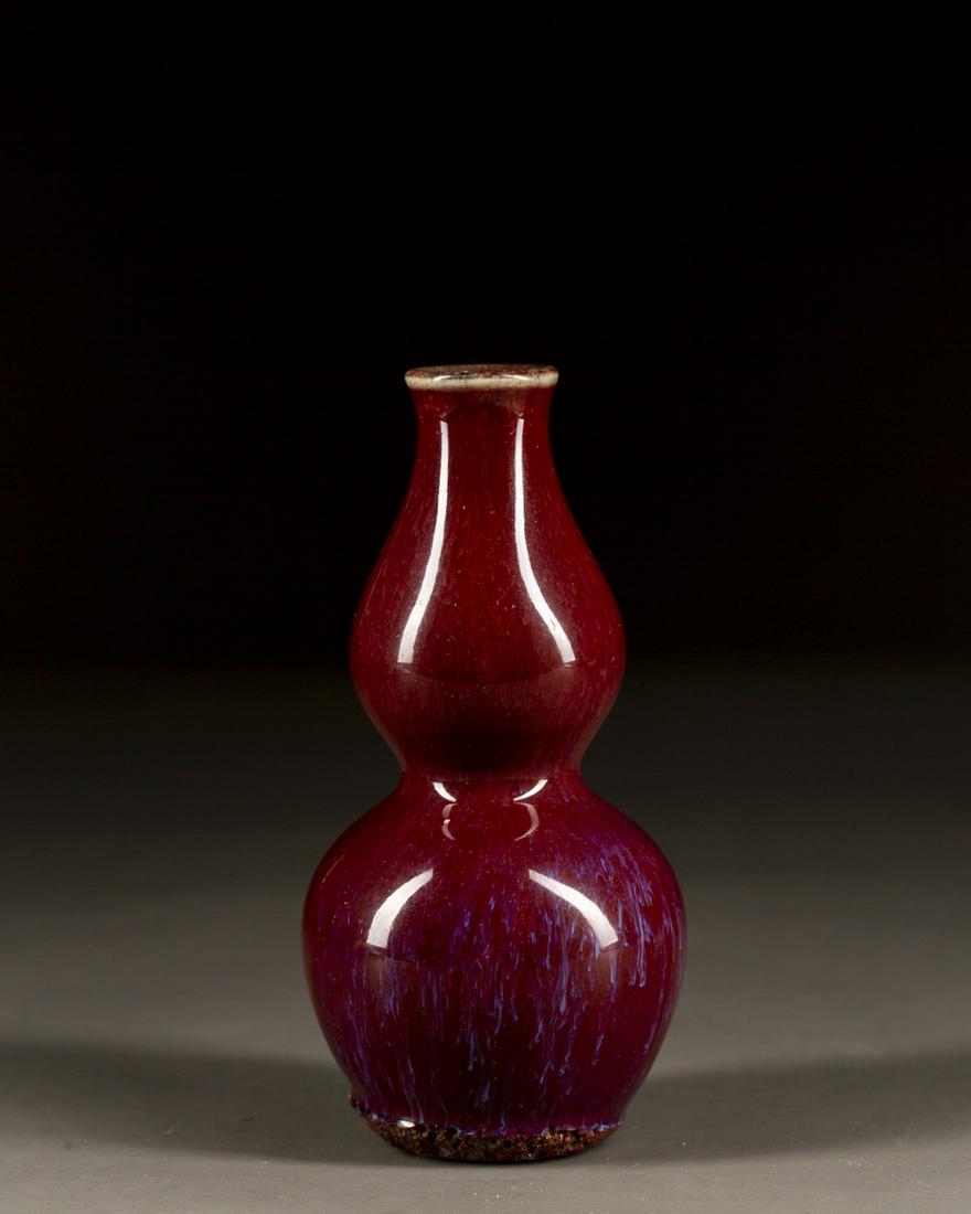 A CHINESE RED GLAZED DOUBLE GOURD VASE, QING DYNASTY (1 of 8)