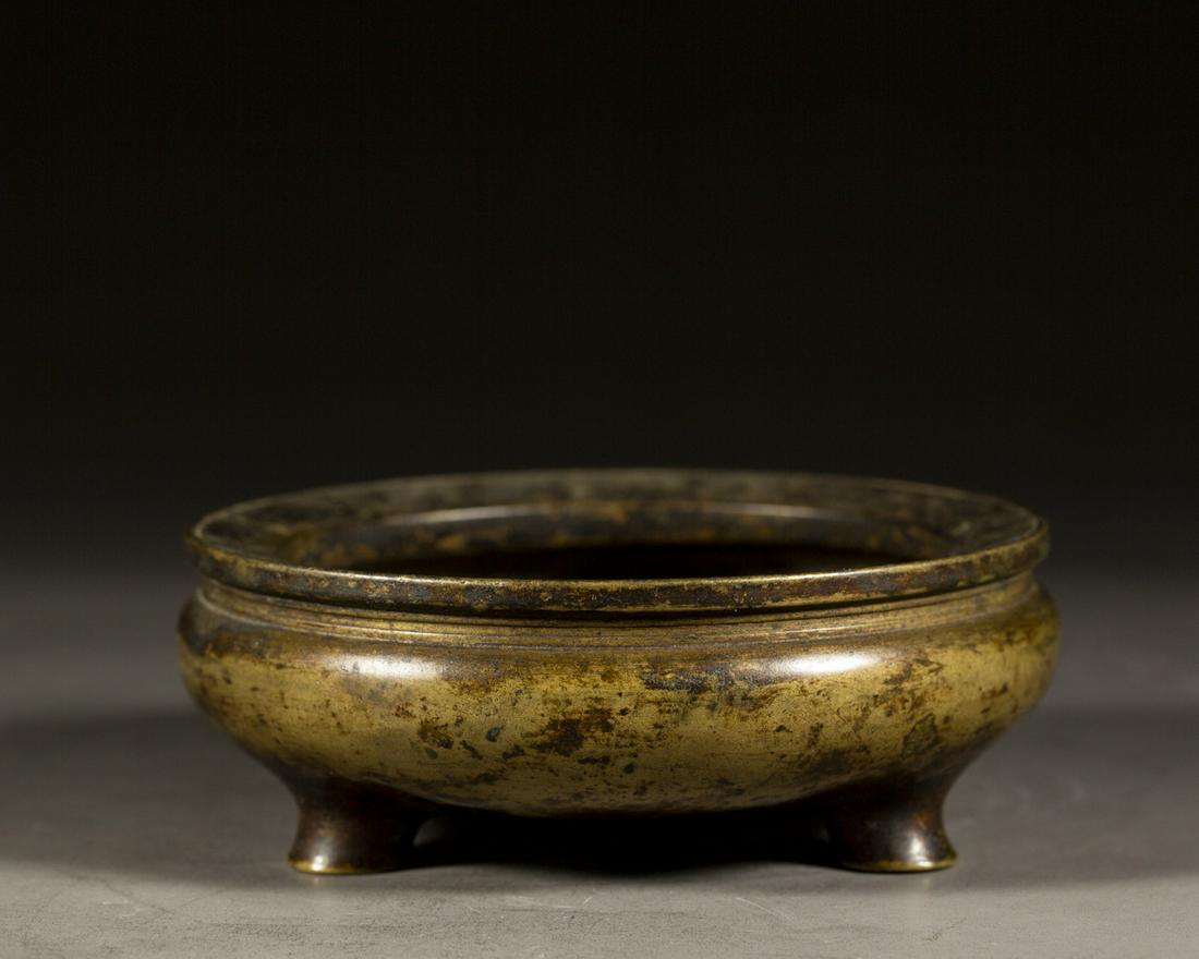 A CHINESE BRONZE TRIPOD INCENSE BURNER, MING DYNASTY (1 of 8)