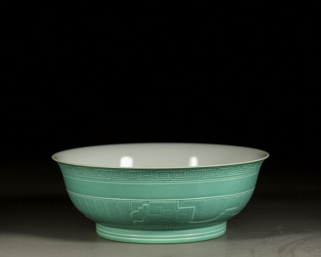 A CHINESE TURQUOISE GLAZED DRAGON BOWL. QING DYNASTY (1 of 5)