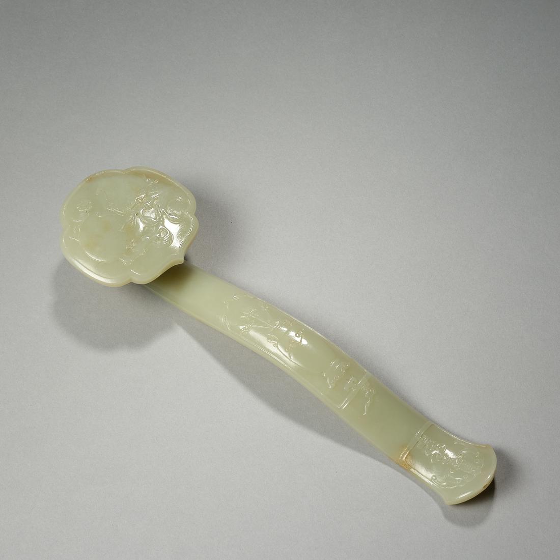 A JADE RUYI SCEPTER CARVED WITH 'BAT,PEACH AND VASE DESIGNSâ€™, QING DYNASTY (1 of 9)