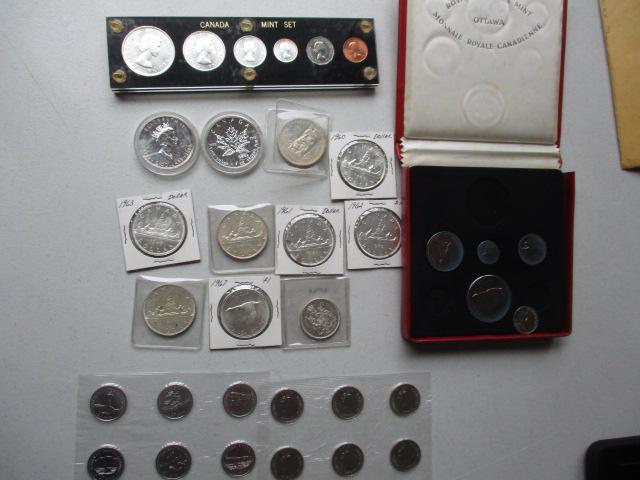 Canadian Silver Dollars and Coin Sets: 1962 Canada Mint Set, 1999 and 2000 .9999 Fine $5 Coins, 8 Silver Dollars, 1964 Half Dollar, (2) 1867-1992 Confederation, 6 Province Coins Sets and Partial 1967 Ottawa Mint Set
