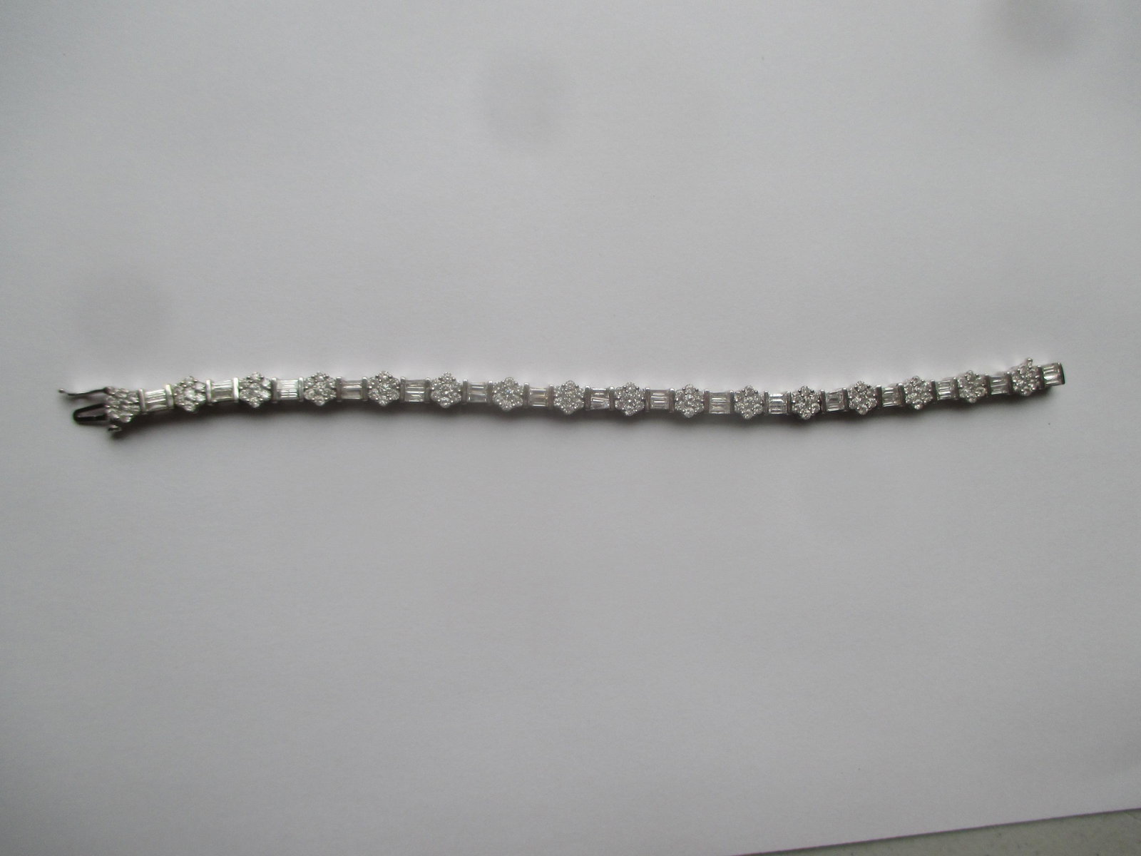 6 Carat (Calculated Weight) Diamond 14K White Gold: 14 Karat White Gold Bracelet with 96 round full count diamonds - 6.0 Carat estimated total weight 6 7/8" - 17.4 Grams - Appraisal Replacement Value - $7,432.00