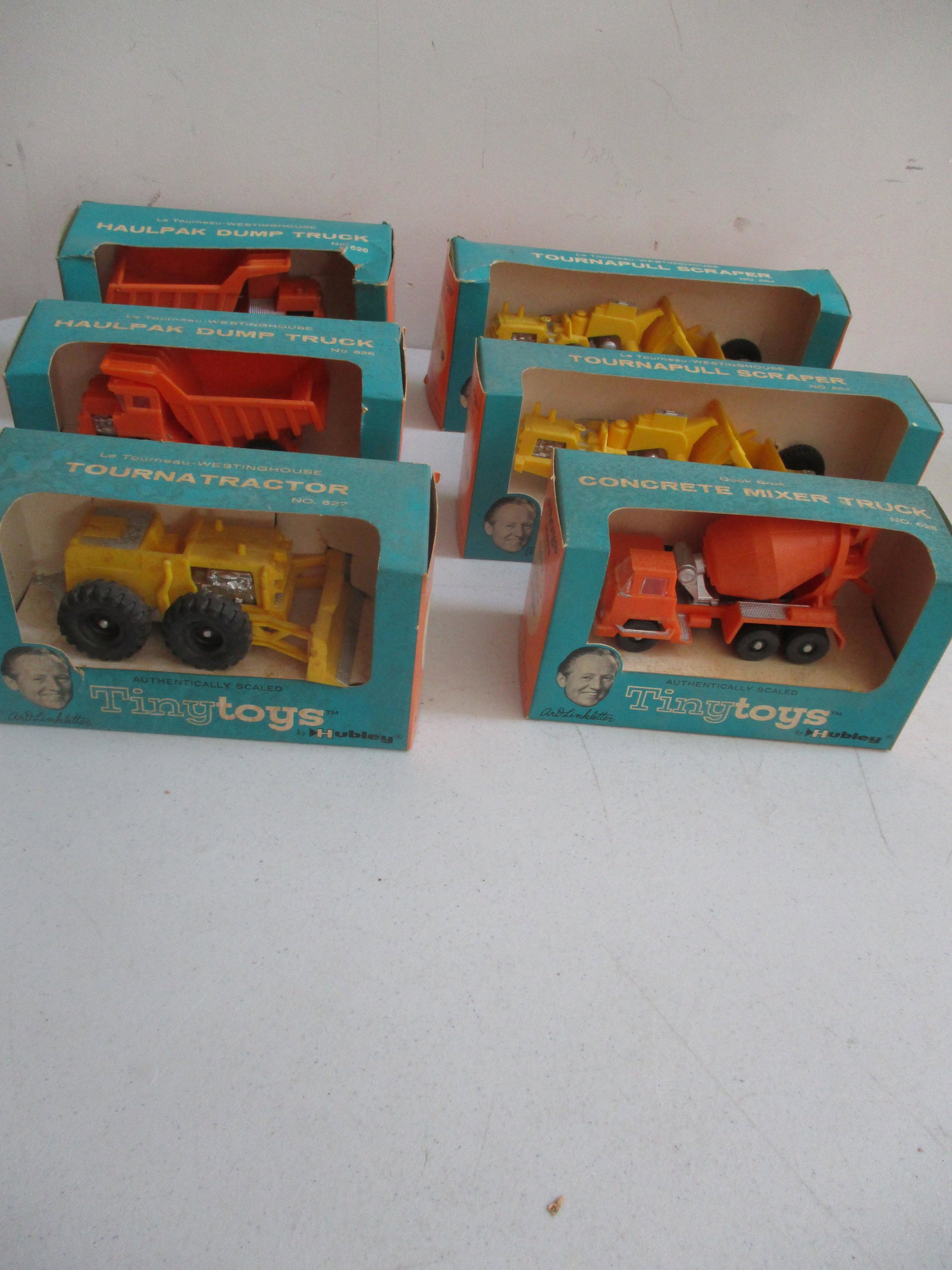 6 Tiny Toys by Hubley Authentically Scaled In Boxes: Art Linkletter Endorsed - Le Tourneau Westinghouse: 2 - Haulpak Dump Trucks No. 626, 2 - Tournapull Scrapers No. 654, Tournatractor No. 627 & Cook Bros.: Concrete Mixer Truck No. 628 in Boxes