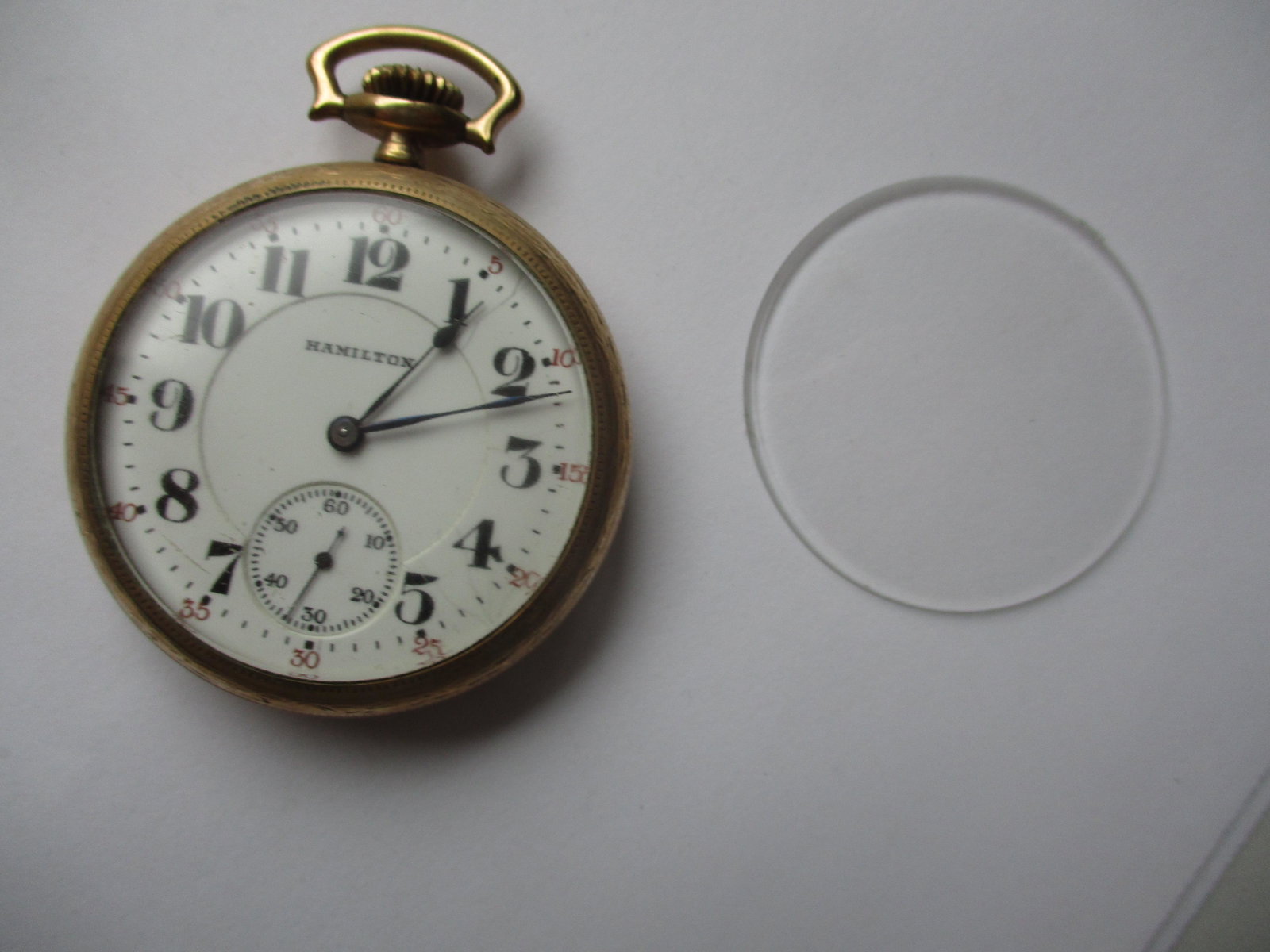 Hamilton 16S 21 Jewel - Gold Plated Pocket Watch: s/n 2323301 with extra crystal (pocket watch tested to see that it runs for 10 seconds)