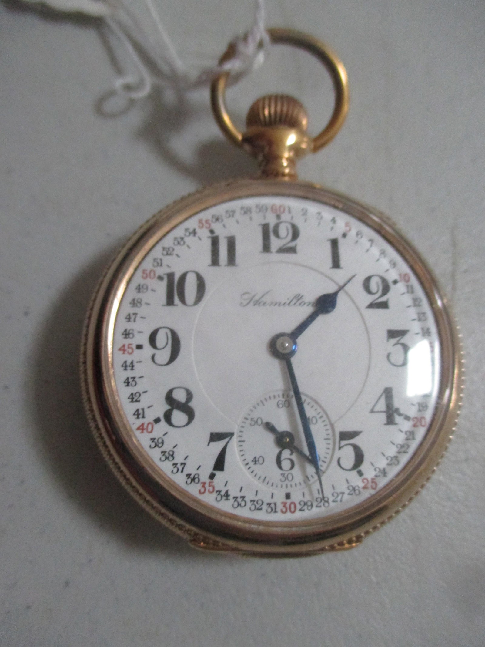 Hamilton 18S 21 Jewel Gold Plated Case Pocket Watch: Train Design on Reverse - Engraved Inside s/n 1423303 (pocket watch tested to see that it runs for 10 seconds)