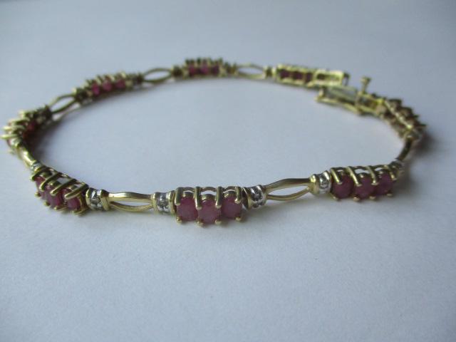 14K 7" Ruby and Diamond Bracelet: Approximately 9 Grams- See Photos for Condition
