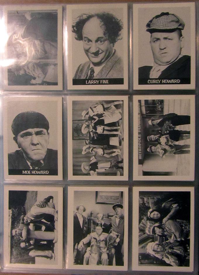 A binder with (4) Modern 3 Stooges Sets (1 of 4)