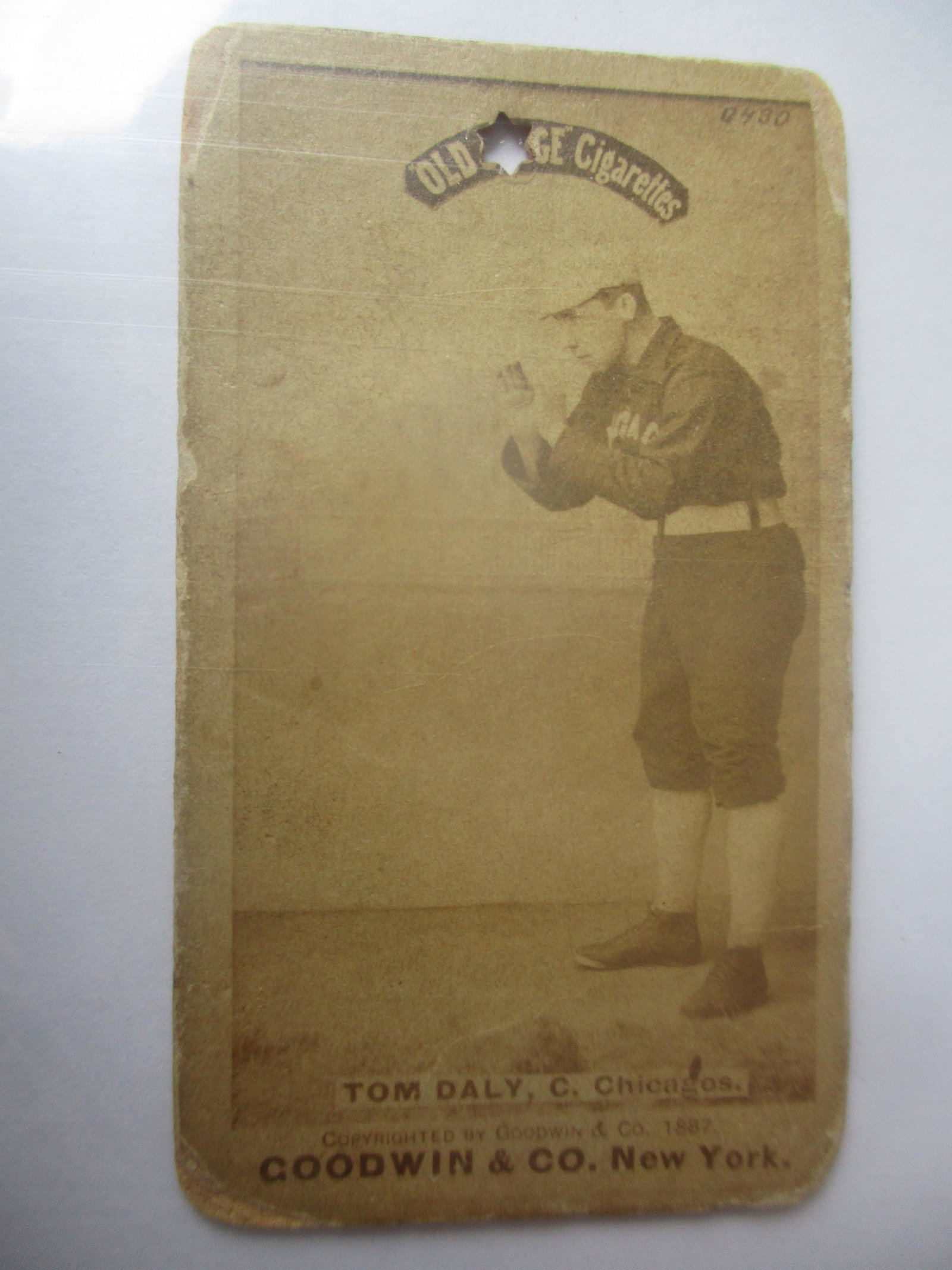 Old Judge Tom Daly Chicago White Sox 1887-1990: Baseball Card. Has Star Shaped Punch Hole and General Wear with corners rounded. See photos