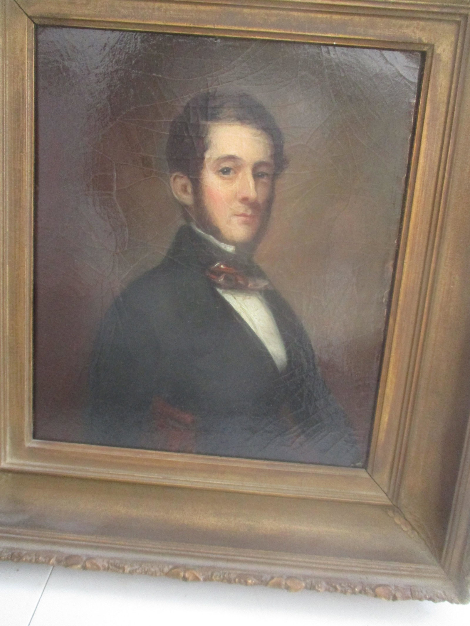 19th Century Portrait of Man with Bowtie O/C: Mounted on Board - Art: 12" x 10 1/2" - Frame: 18" x 17" - Painting has some age cracking - See photos for condition and details
