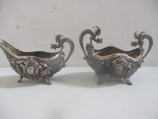 .800 Silver Gothic Design Repousse Gargoyles C/S: Creamer and Sugar marked 800. 3" High x 5". Appr. 7.9 ounces. See photos for condition and details