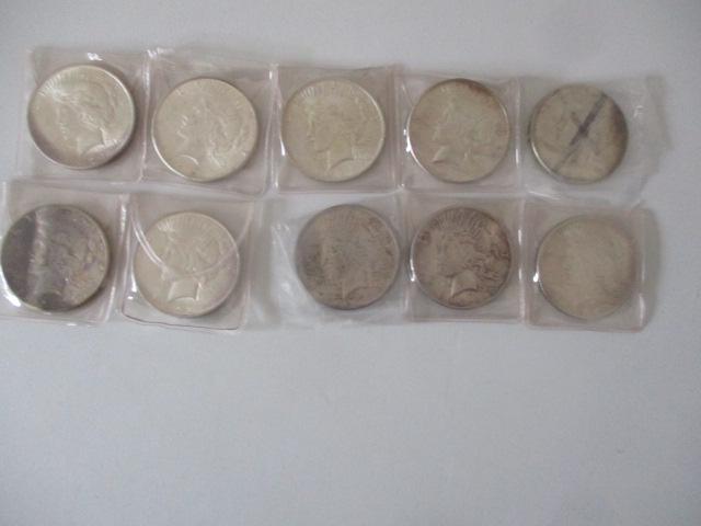 (10) 1923 Silver Peace Dollars: See photos for condition and details