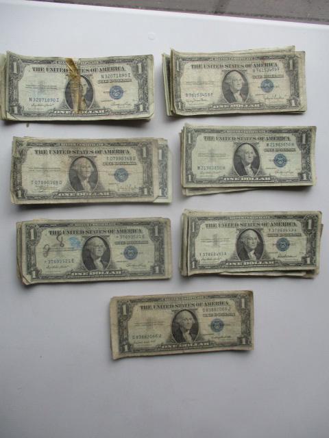 (70) $1 Silver Certificates: Wear - one taped, a few have pen marks - See photos for condition and details